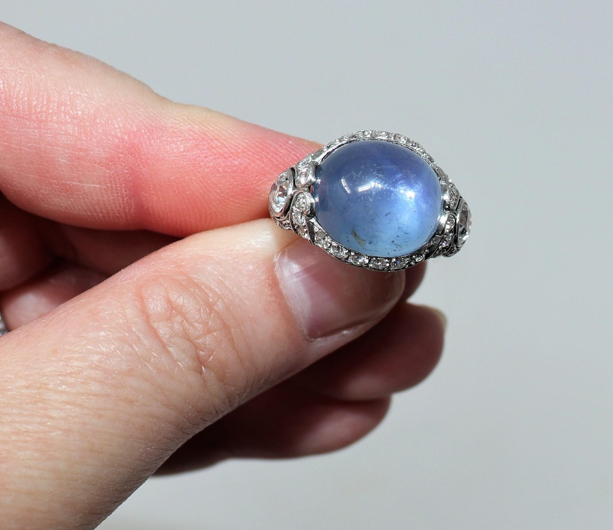 Oval Cut Oval Cabochon Star Sapphire and Diamond Ring in Platinum 15.4 Carats Total For Sale
