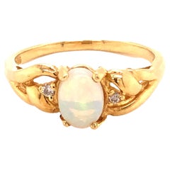Oval Cabochon White Opal and Diamond Ring in 14k Yellow Gold