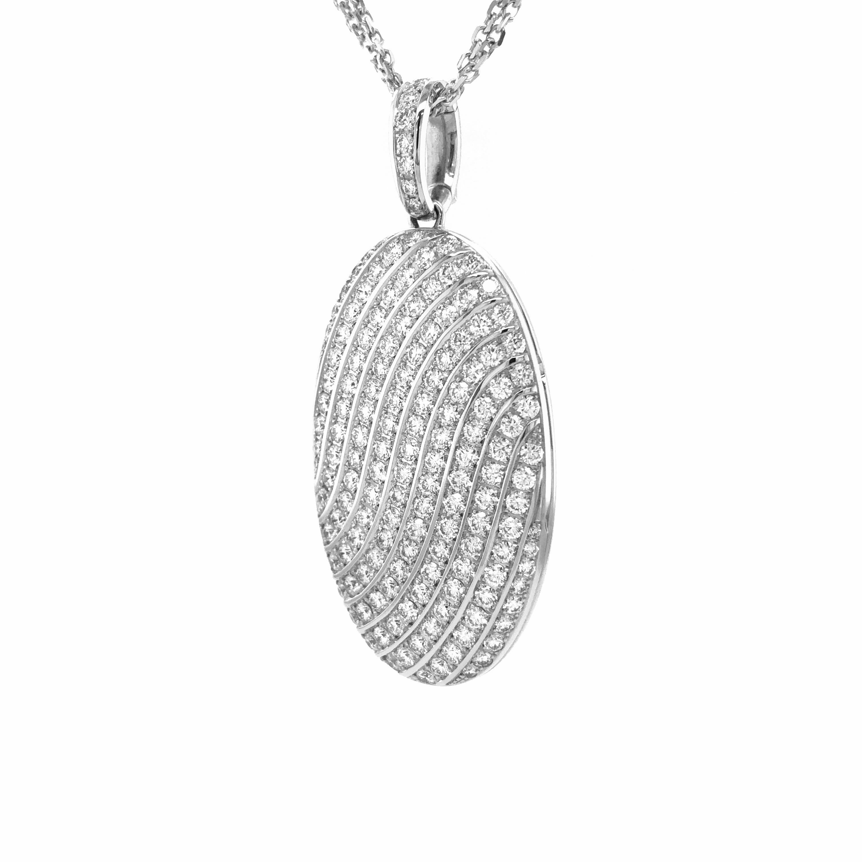 Victor Mayer customizable oval pendant locket 18k white gold, Calima Collection, 151 diamonds, total 4.18 ct, G VS, brilliant cut, measurements app. 40 mm x 24 mm

About the creator Victor Mayer
Victor Mayer is internationally renowned for elegant