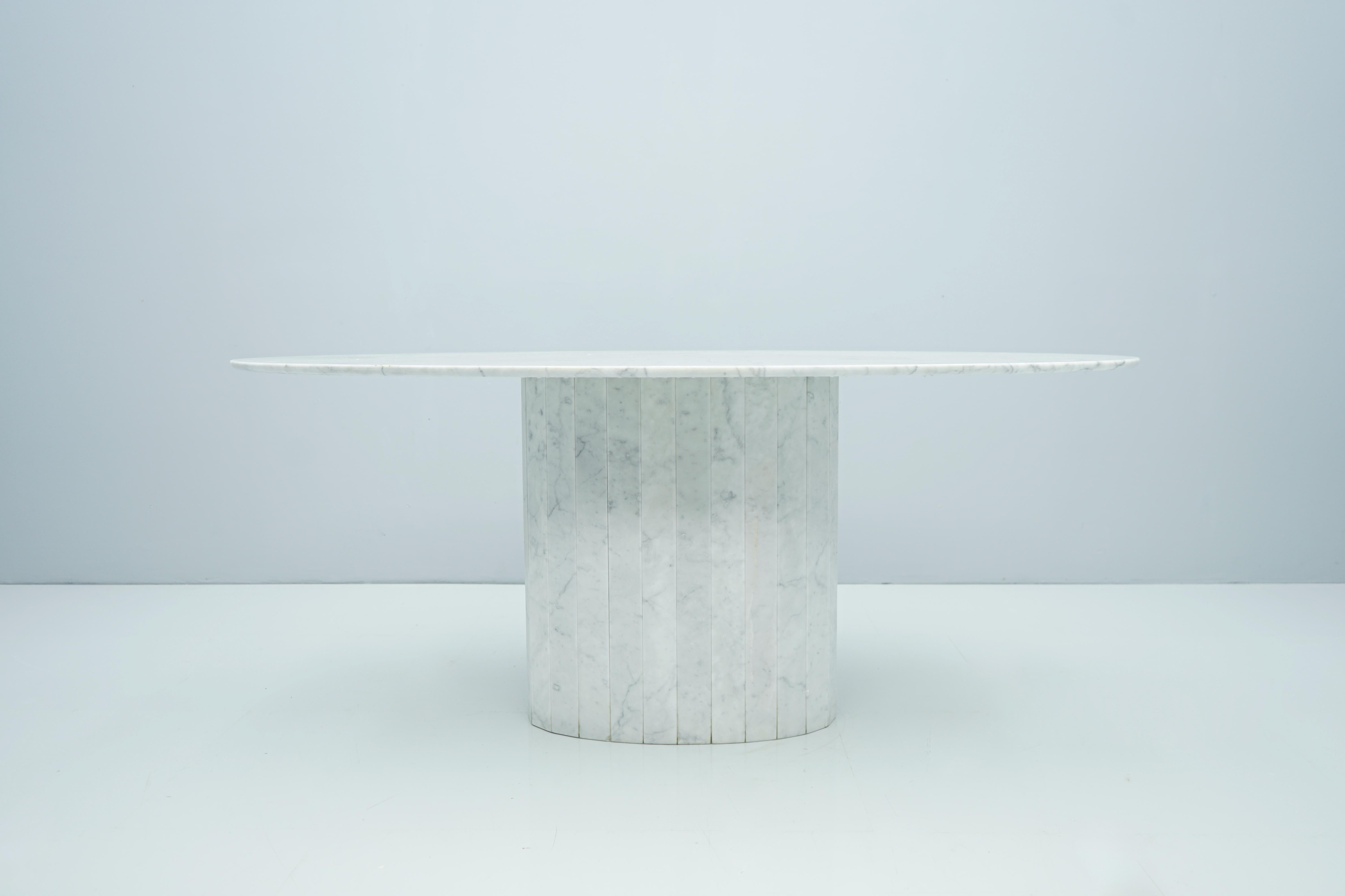 white oval marble dining table