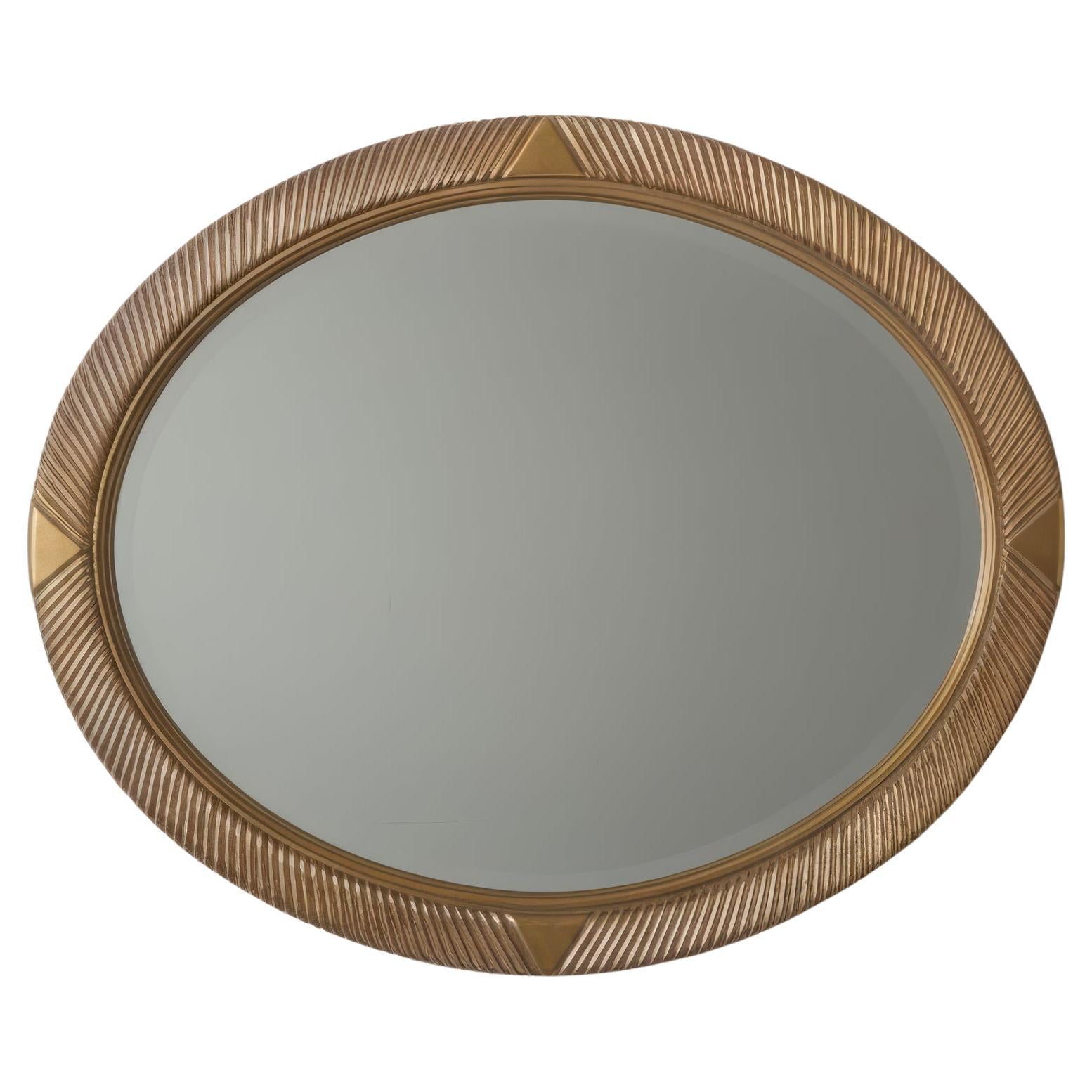 Oval Carved Wood Mirror with Fluted Gilt Frame For Sale