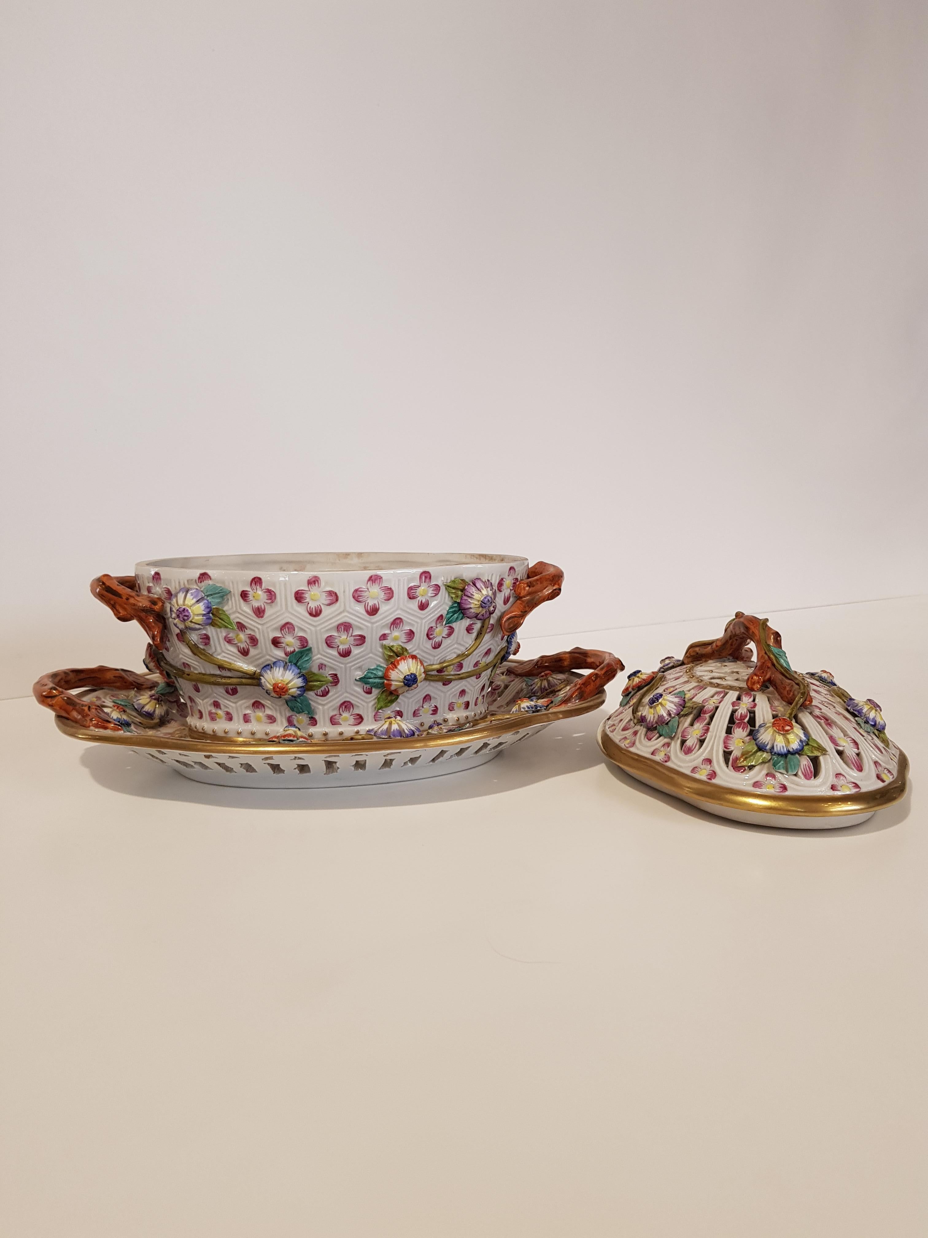 Original Italian Capo di Monte porcelain.
This Louis XVI style object is composed by 3 elements, a perforated lid with handle, a container with handles, and a perforated plate with handles, all finely realized and hand decorated with ancient