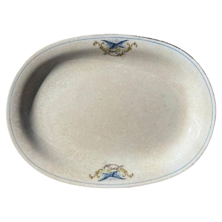 Fuente ovalada de cerámica Bluebird Chinaware en crema con adornos dorados - Años 20 en venta