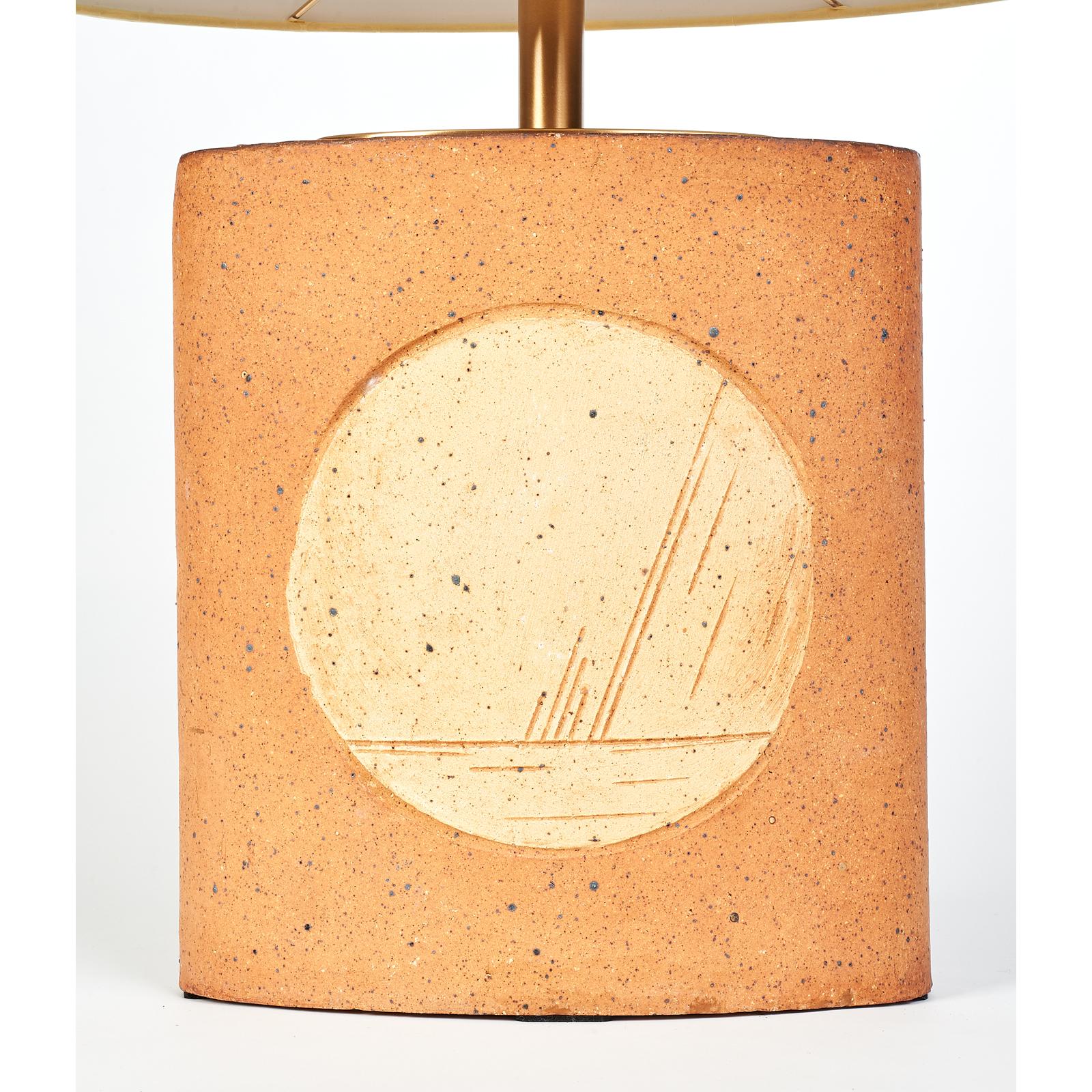 France, 1970s
A pair of unglazed oval ceramic table lamps incised with abstract geometric motifs.
The other lamp in the pair is the same model but a different geometric motif  ( see last two images )
Dimensions: 23 H x 13 W x 8.5 D
Rewired for use