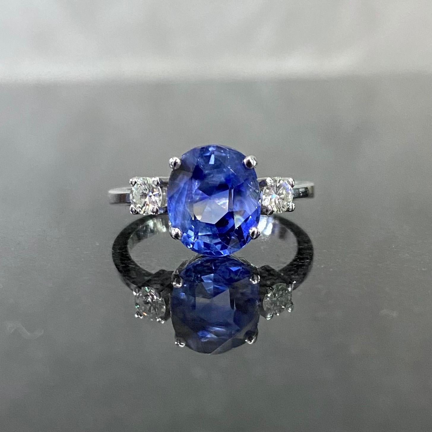 Oval Cut Oval Ceylon Sapphire Round Diamond Three Stone Engagement Ring White Gold For Sale