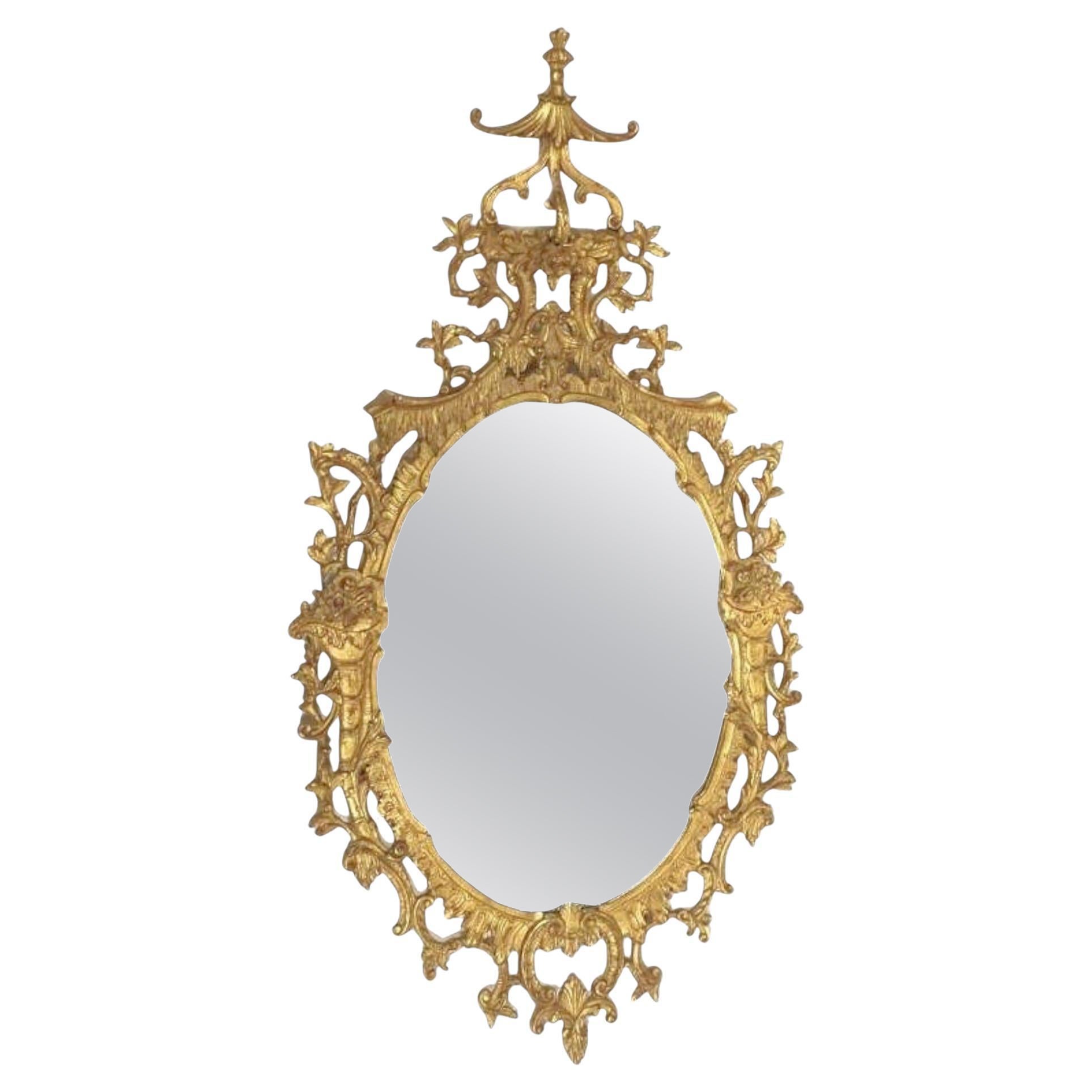 Specchio ovale cinese in legno dorato stile Chippendale