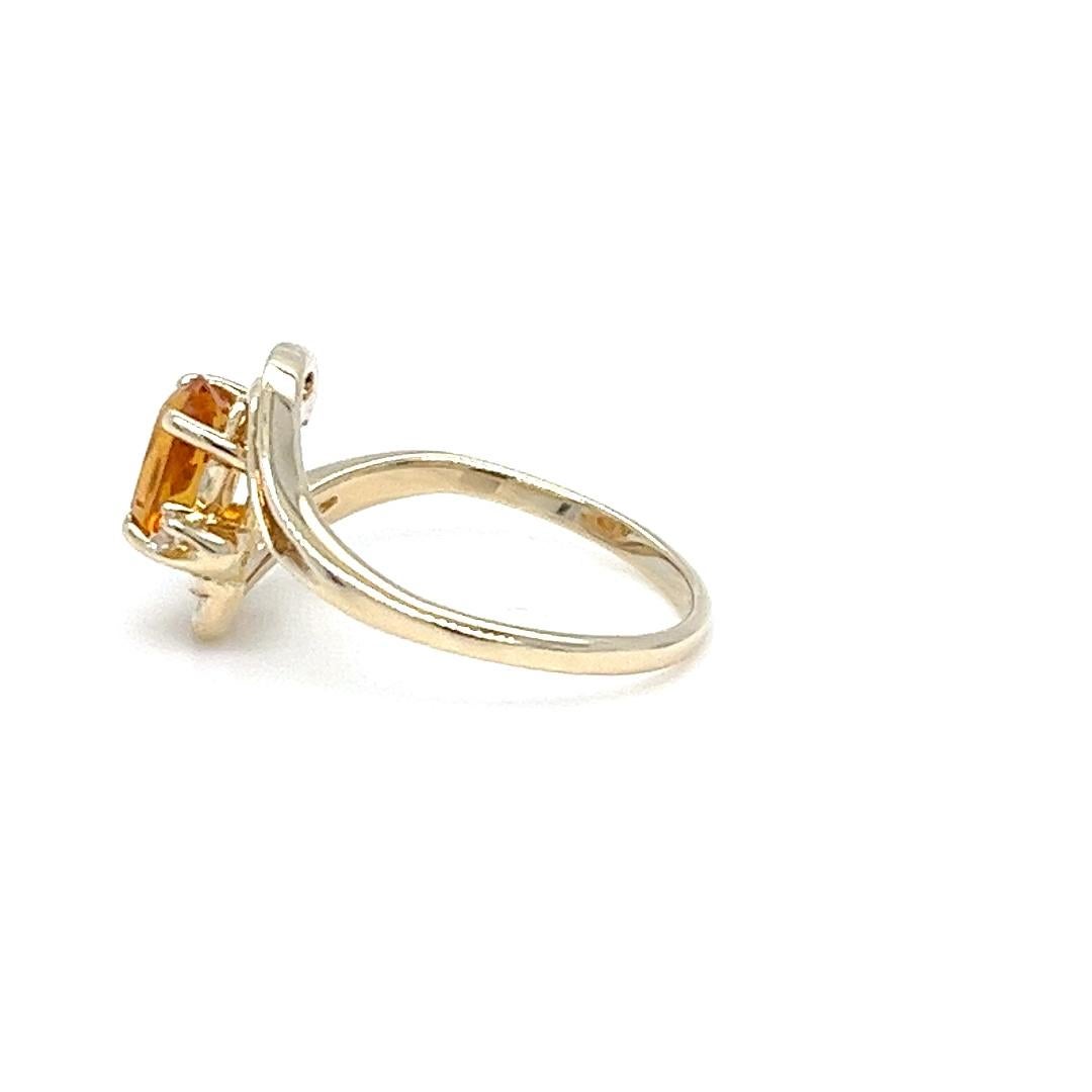 Oval Cut Oval Citrine and Diamond Bypass Ring in Yellow Gold For Sale