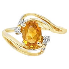 Ovaler Bypass-Ring aus Gelbgold mit Citrin und Diamant
