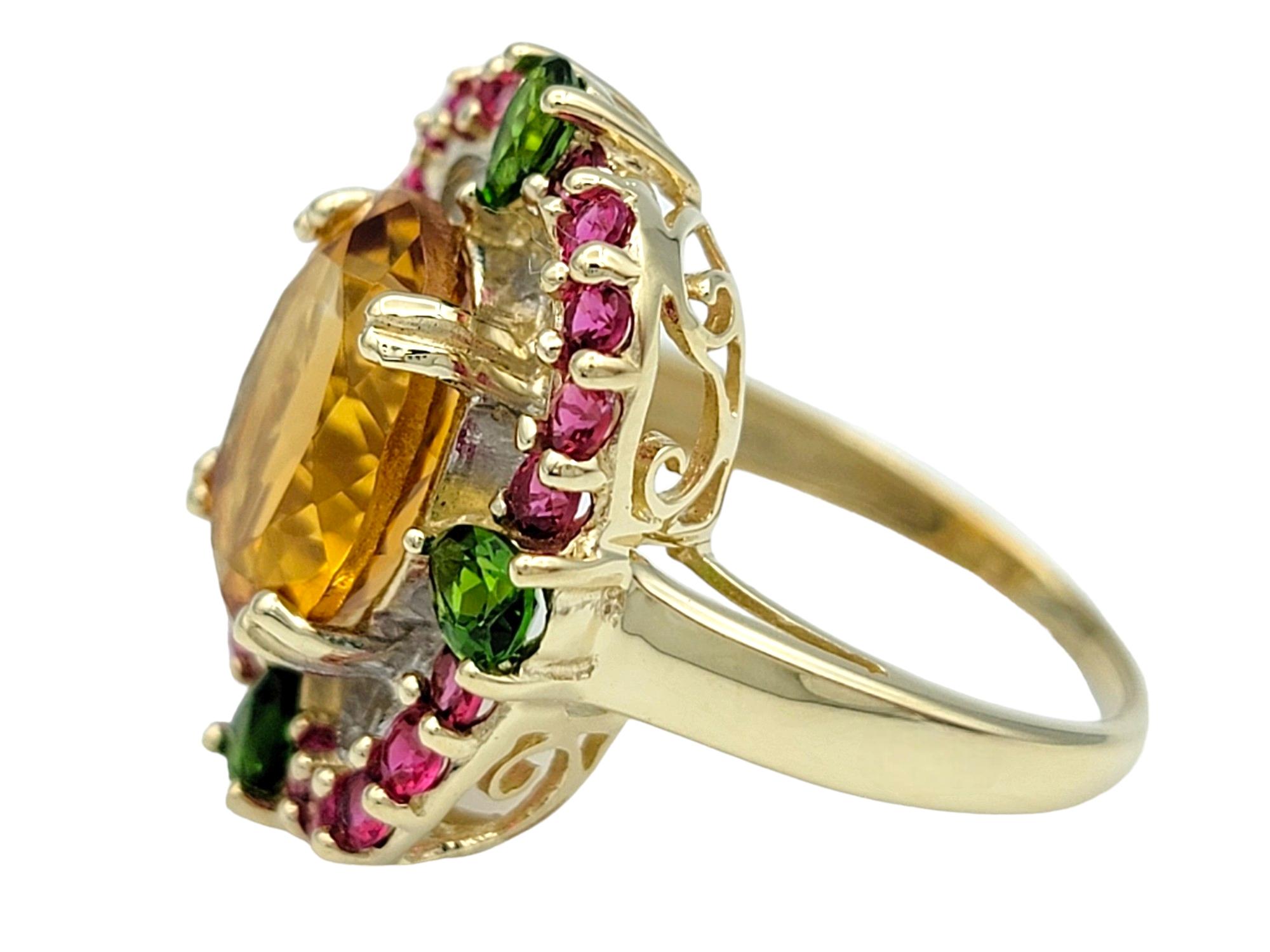 Oval Cut Oval Citrine Cocktail Ring with Rubies and Peridots in 14 Karat Yellow Gold For Sale