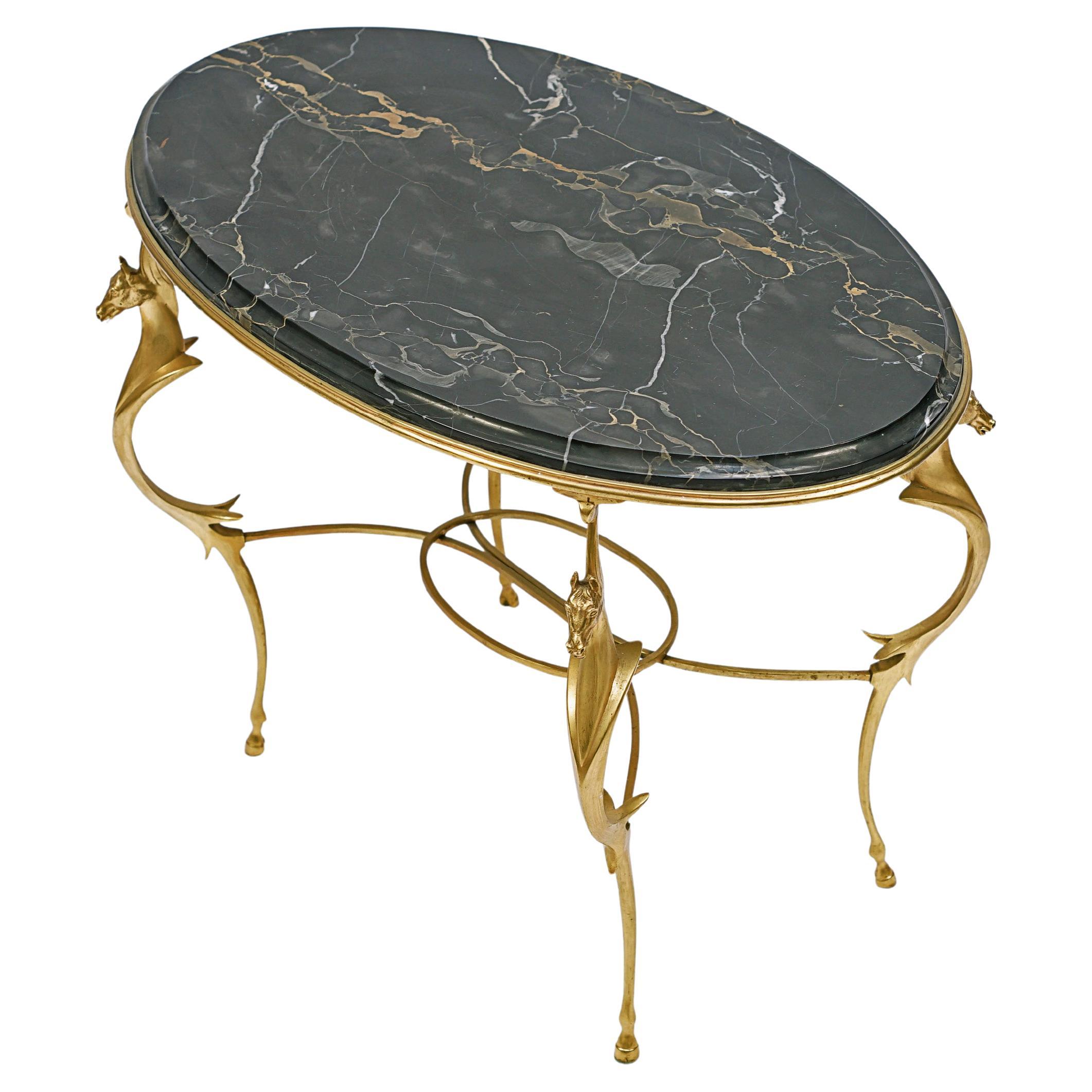Table basse ovale d'Andre Arbus en vente