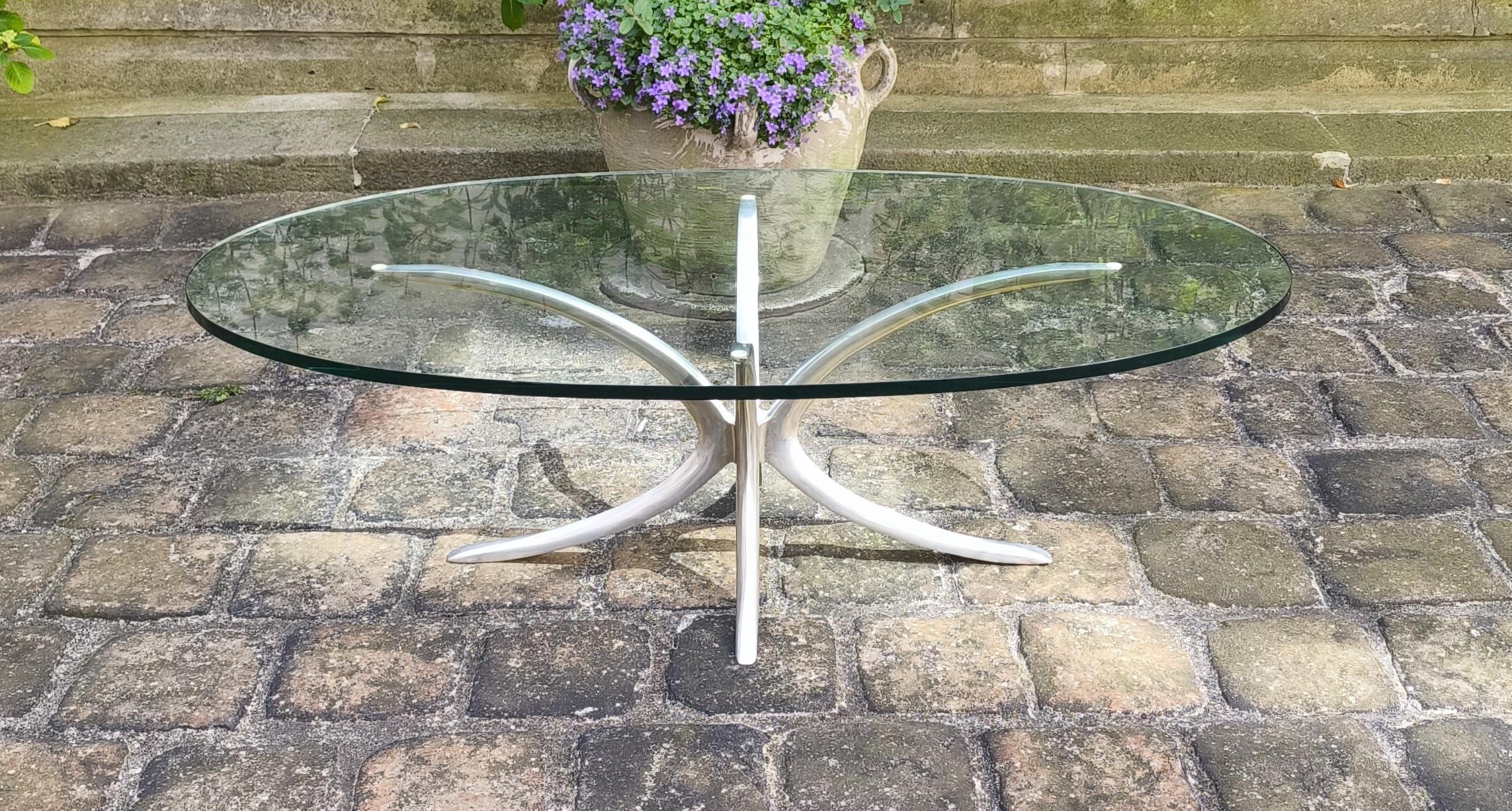 Superb metal coffee table with an oval glass top.
.
Attributable to Michel Mangematin, France (no documentation founded but really recalls the work of this famous designer.
.
The metal base is in good condition with some signs of wear, as is the