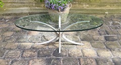 Oval coffee table from the 1960s that can be attributed to Michel Mangematin
