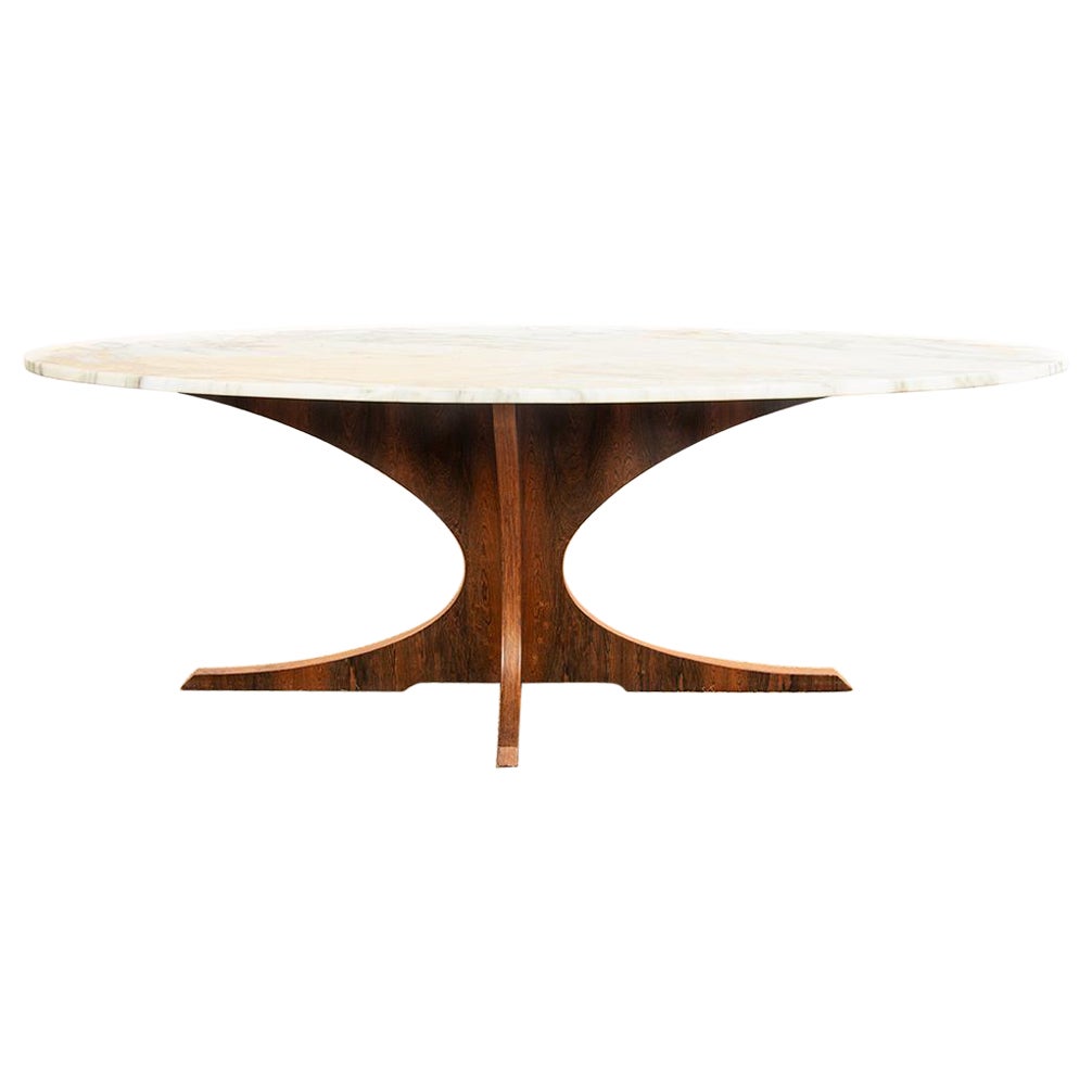 Oval coffee table in Carrara marble and rosewood by Hugues Poignant 1960.