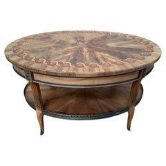 Oval coffee table – Louis XVI style – Marquetry, brass gallery, bronze shoes