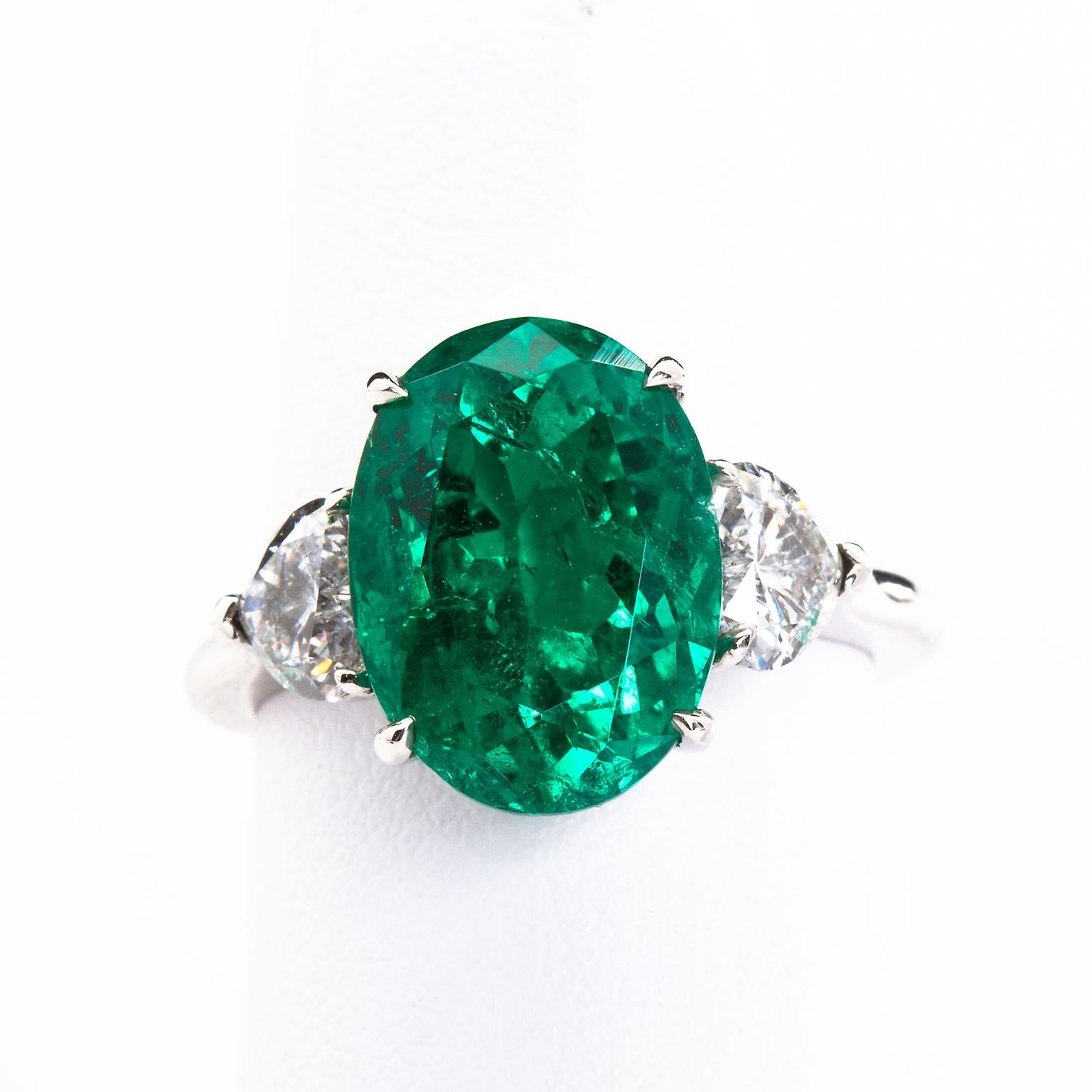 emerald ring with side stones