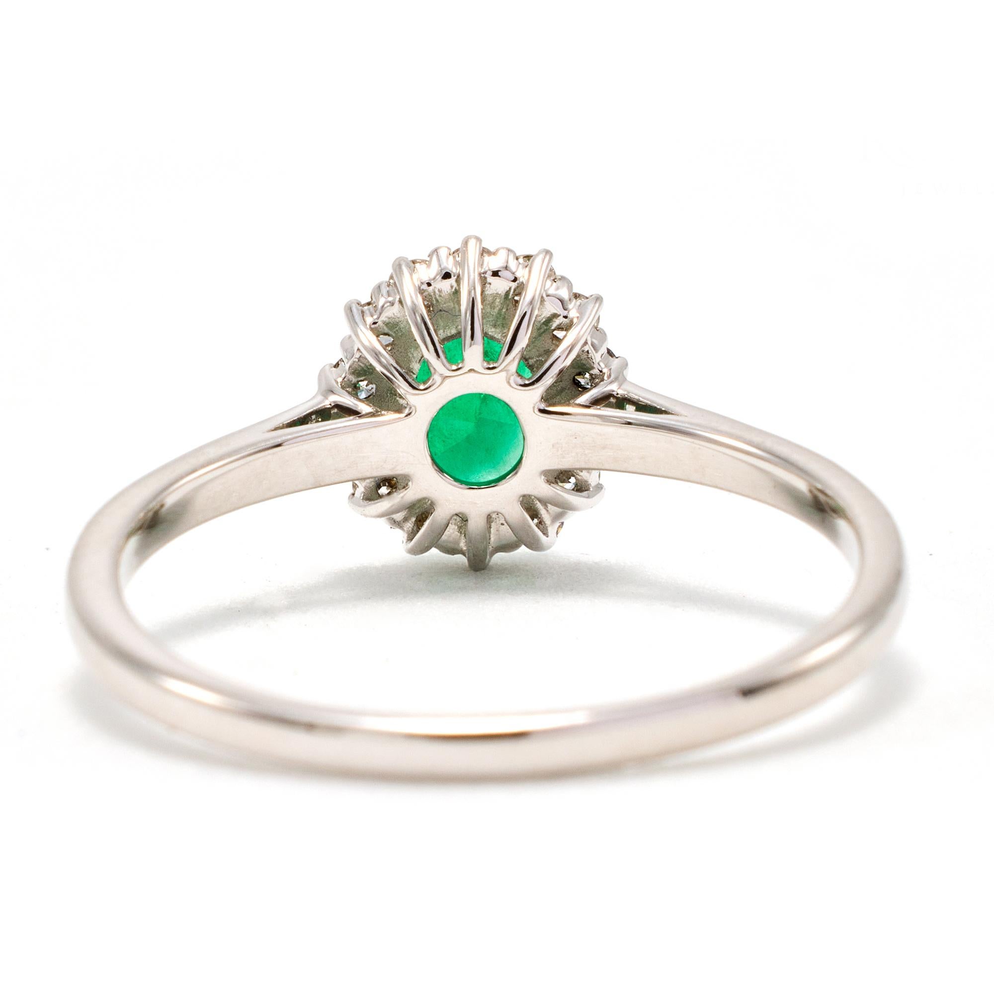 Oval Cut Oval Colombian Emerald Ring with Diamonds Around Set in 18k White Gold For Sale