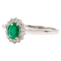 Oval Colombian Emerald Ring with Diamonds Around Set in 18k White Gold