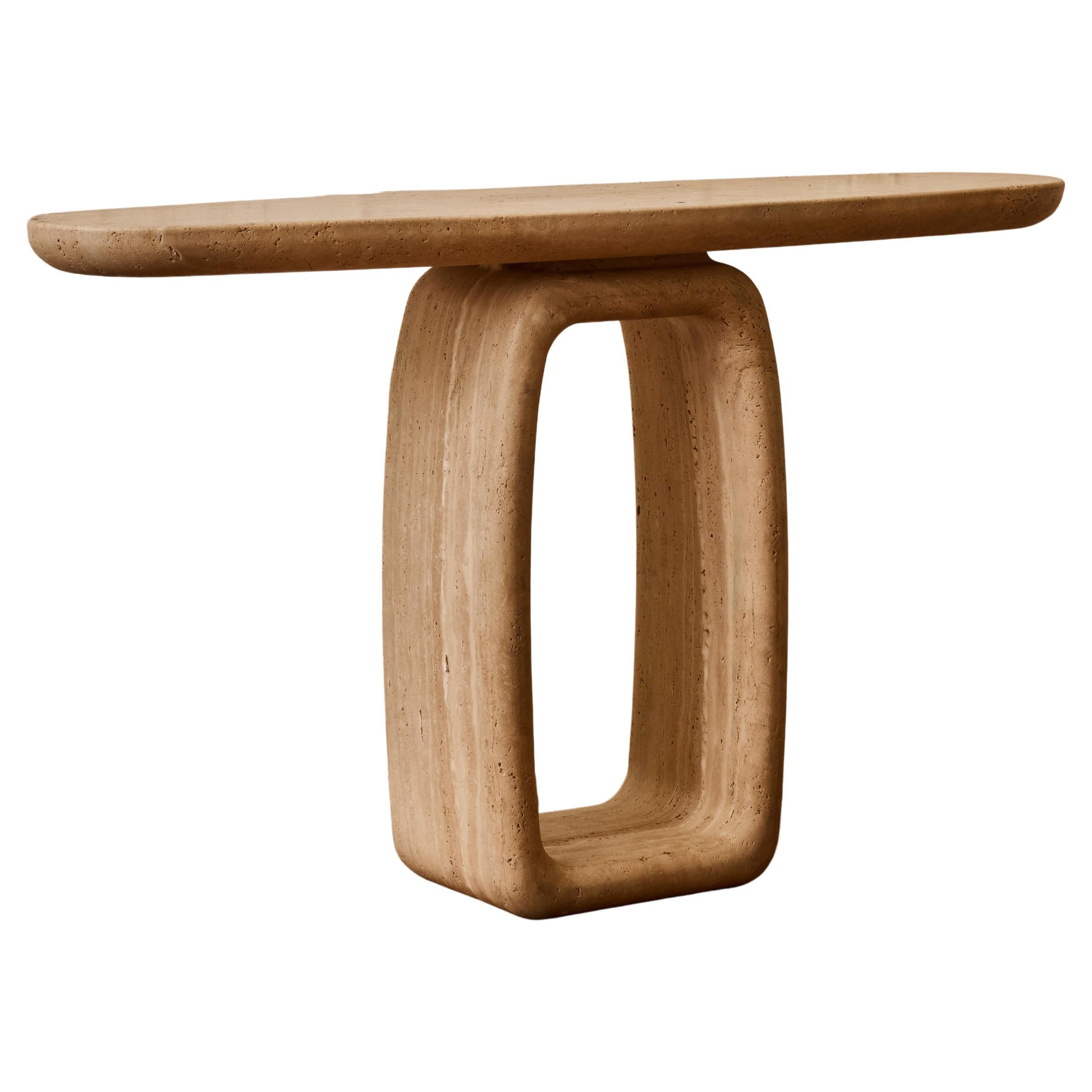 Oval console in travertine stone