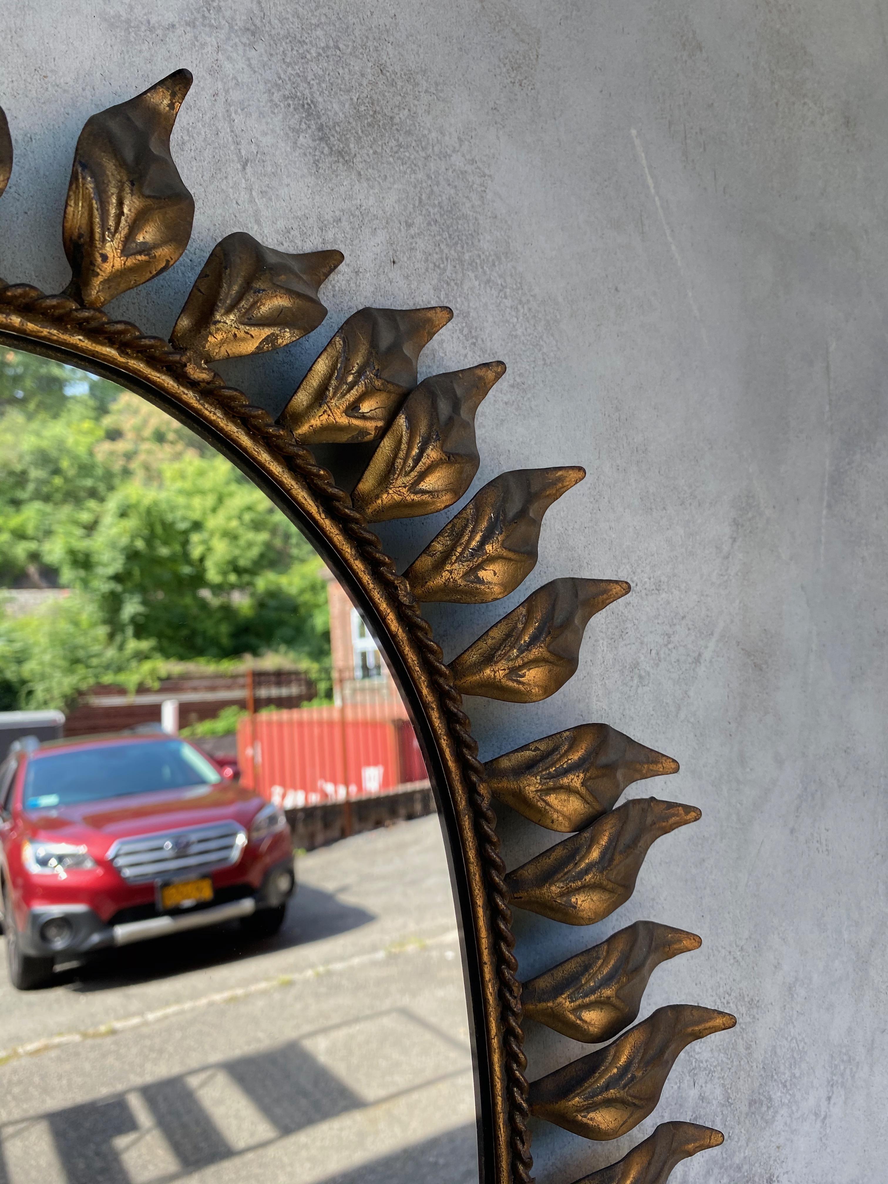 Spanish Oval Gilt Metal Sunburst Mirror with Curved Leaves For Sale 7