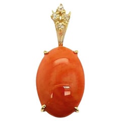 Oval Coral and Diamond Pendant in Yellow Gold