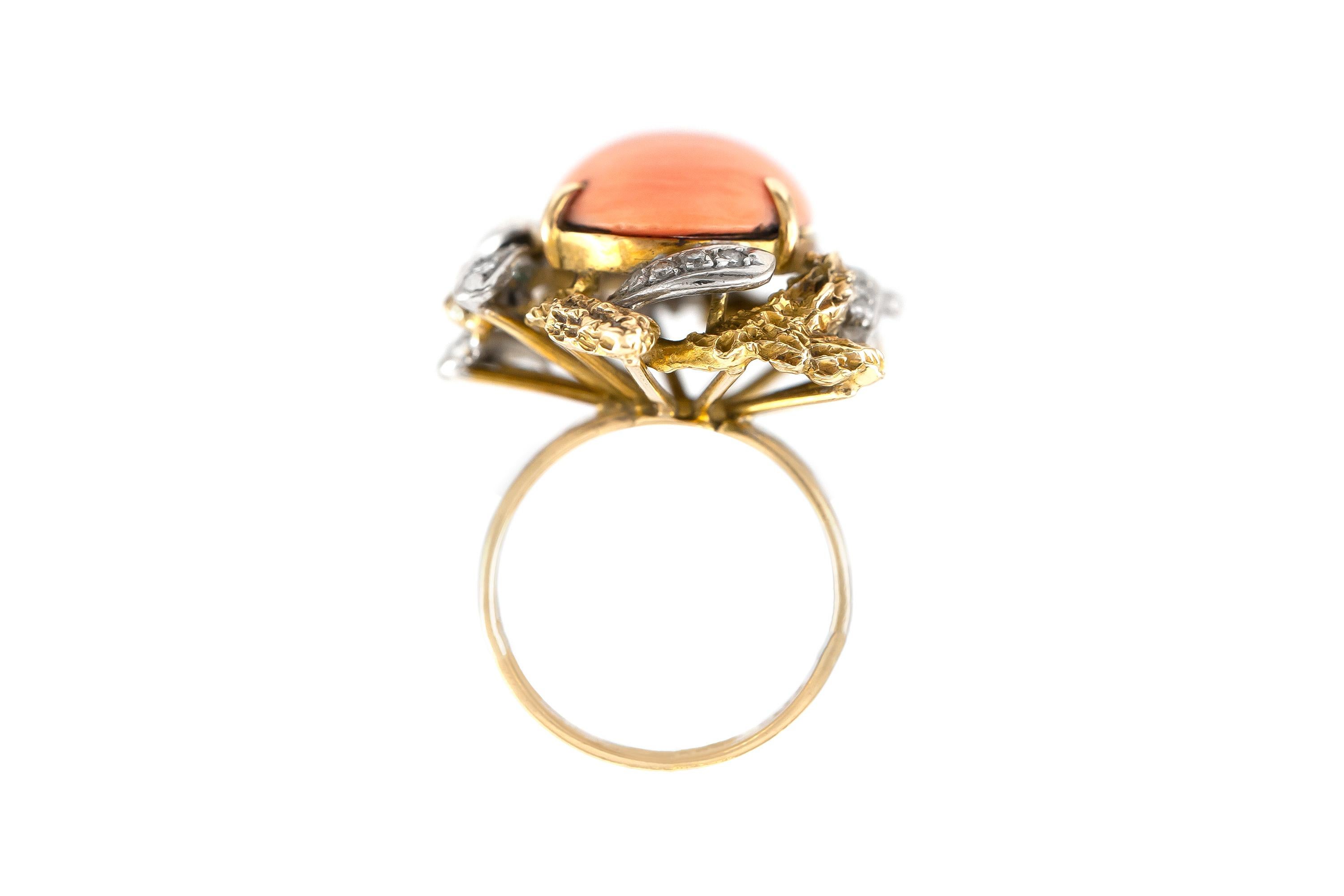 Cocktail ring finely crafted in 14 k gold with diamonds weighing a total of 0.15 k, and a coral. 
Circa 1950.