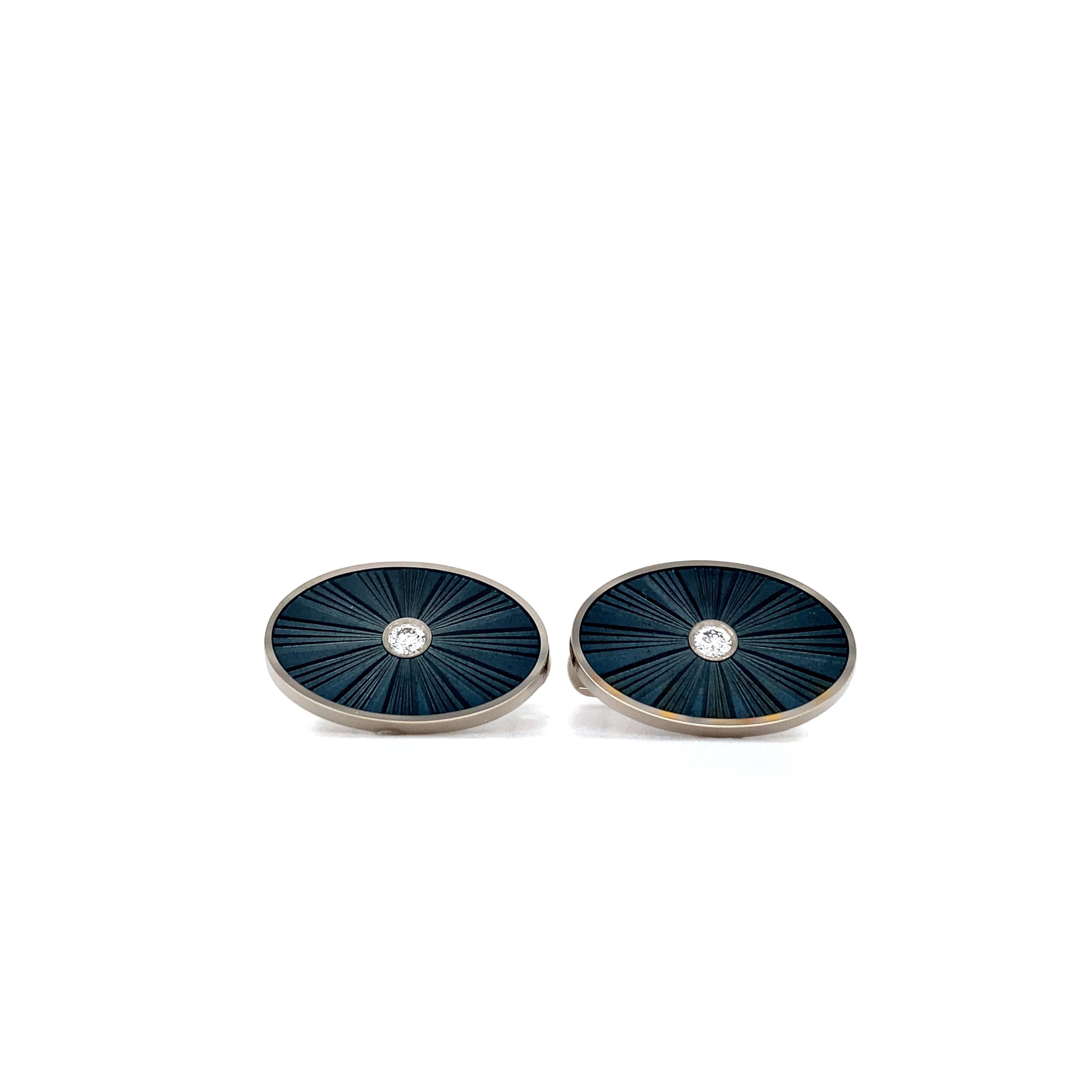 Victor Mayer oval cufflinks 18k white gold, falcon grey vitreous enamel, sunburst pattern guilloche, 2 brilliant cut diamonds, total 0.12 ct, G VS

About the creator Victor Mayer
Victor Mayer is internationally renowned for elegant timeless designs