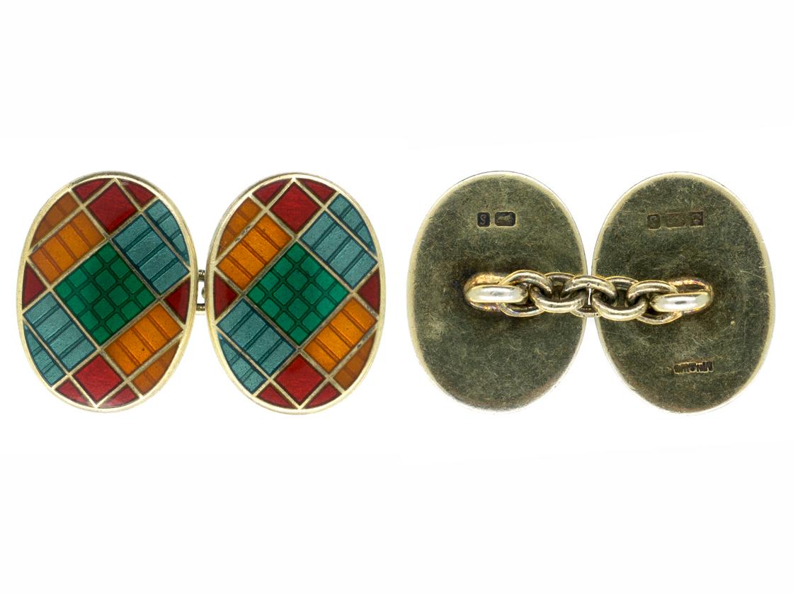 A pair of oval shaped double sided cufflinks in multicoloured enamel over silver gilt. Excellent condition and hallmarked for Birmingham 1992. Fitted with chain link connections.
Measures 18mm in height x 13mm in width.
1990’s Vintage piece.
20th