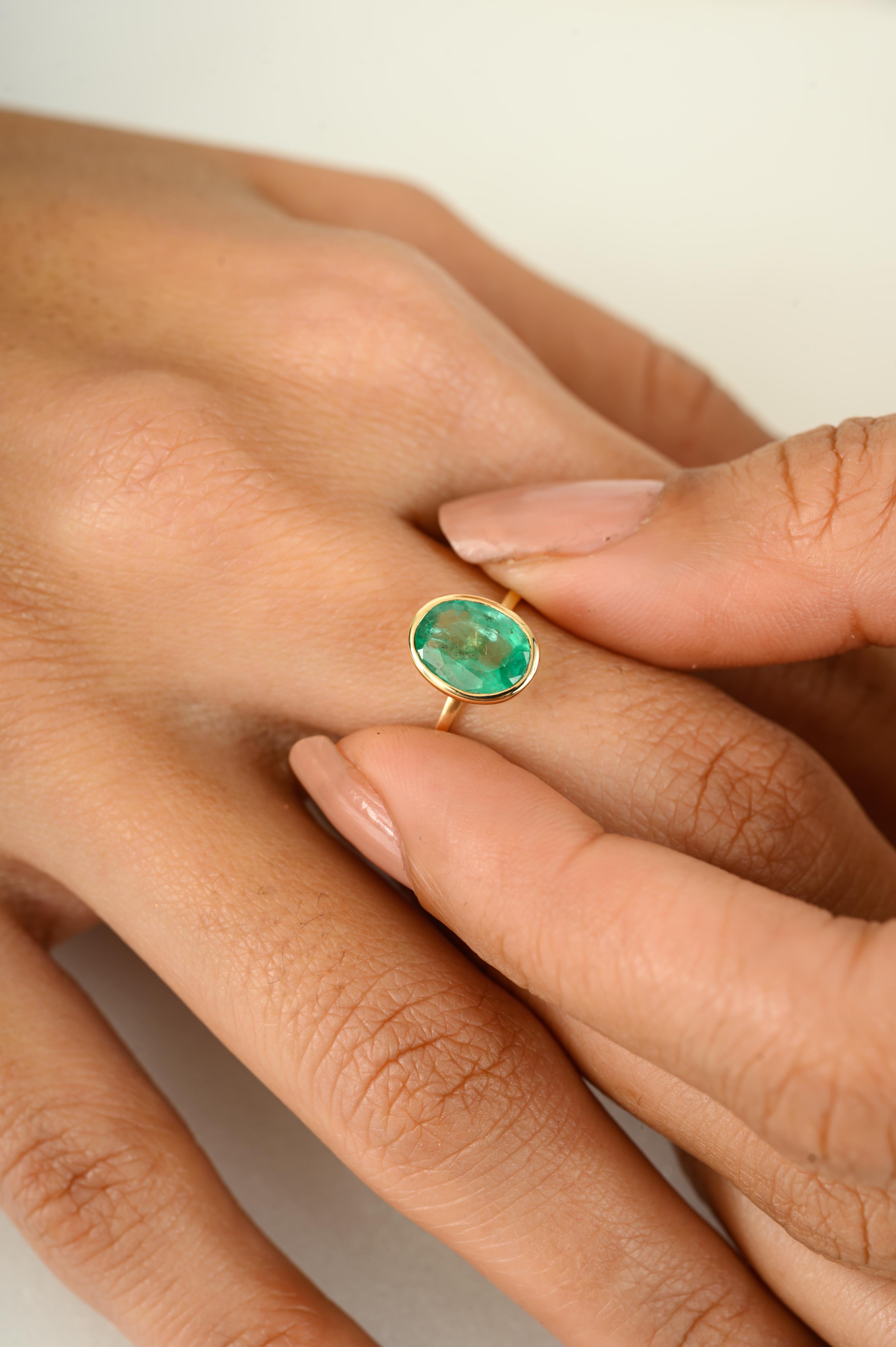 For Sale:  Oval Cut 1 CTW Natural Zambian Emerald Solitaire Unisex Ring in 14K Yellow Gold 6