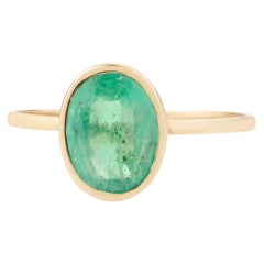 Bague solitaire unisexe en or jaune 14 carats avec émeraude naturelle de Zambie de taille ovale 1 carat