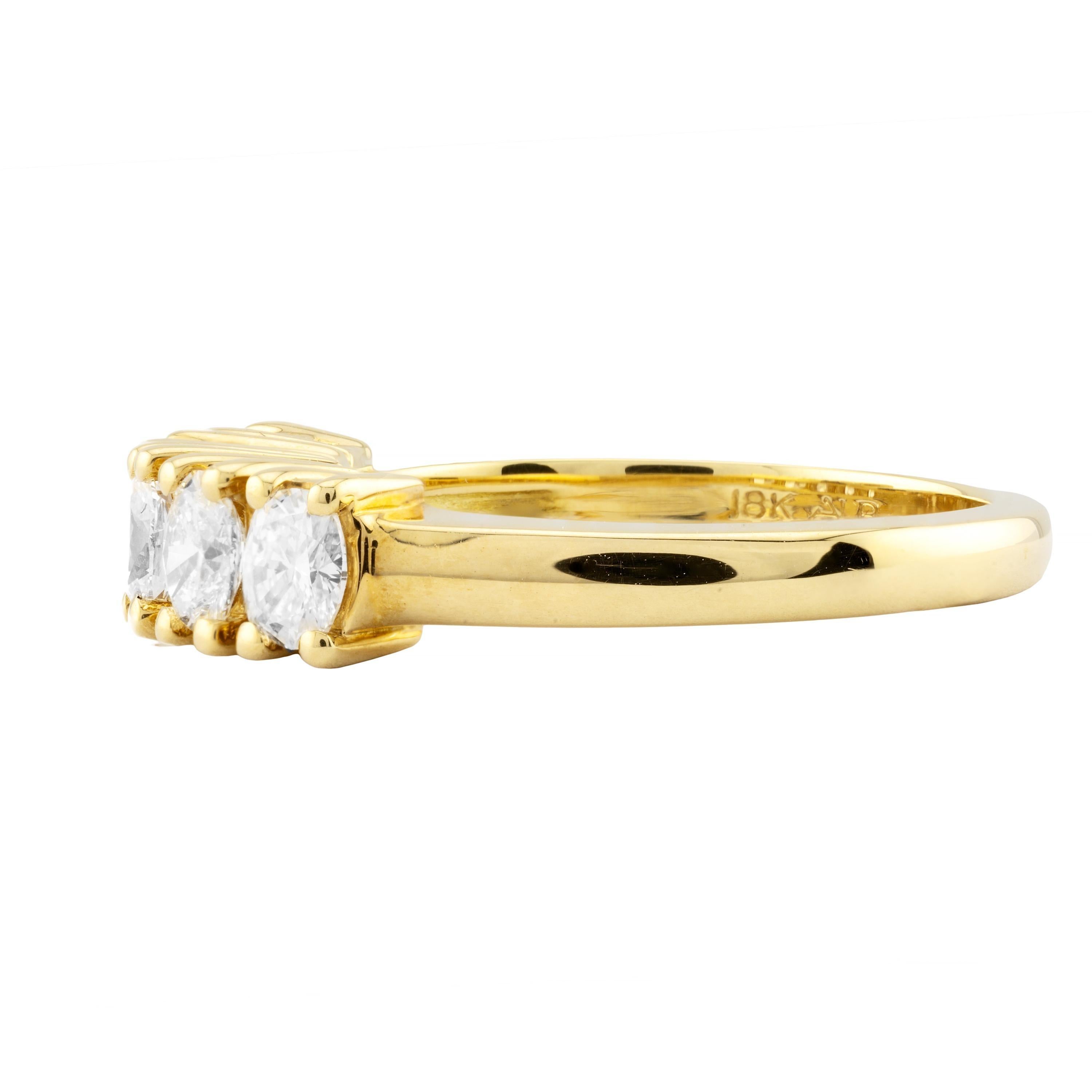 Aston Estate Jewelry Presents:

A fine quality oval cut diamond band ring in rich 18 karat yellow gold. Set with five natural oval cut diamonds of G color with VS1 clarity and weighing a combined 1.00 carats.

Hallmarked as 18 karat gold, with