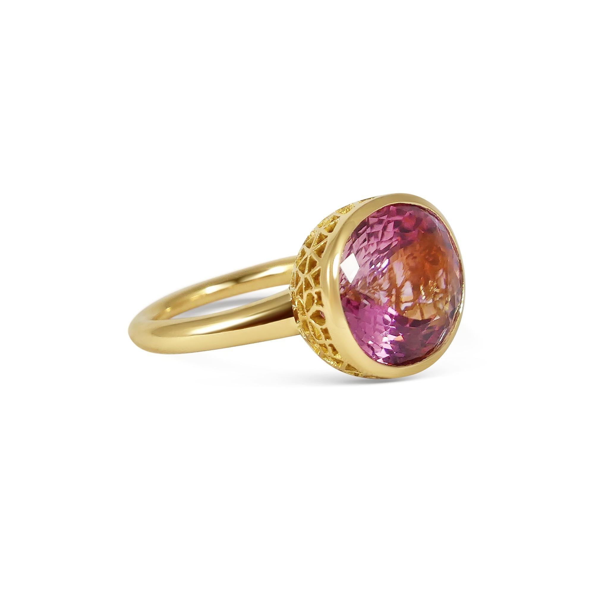 Handcrafted Oval Cut 13,95 Carats Pink Tourmaline 18 Karat Yellow Gold Cocktail Ring. Our expert craftsmen hand pierce our iconic gold lace to fit each stone on a tapered band making each ring One of a Kind. This unique technique, inspired by our