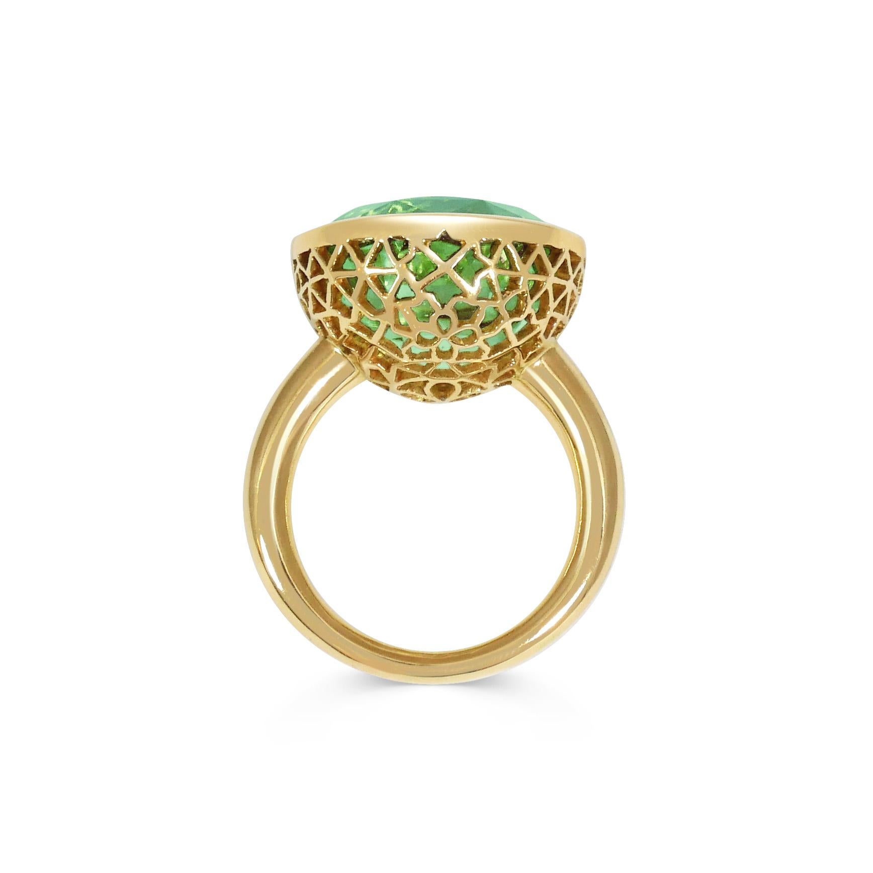 Handcrafted Oval Cut 15,50 Carats Green Tourmaline 18 Karat Yellow Gold Cocktail Ring. Our expert craftsmen hand pierce our iconic gold lace to fit each stone on a tapered band making each ring One of a Kind. This unique technique, inspired by our