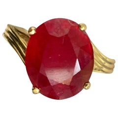Oval Cut 7 Carat Treated Ruby 14 Karat Yellow Gold Ring,