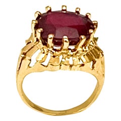 Anello in oro giallo 18 carati con rubino trattato taglio ovale da 7 carati, Unisex
