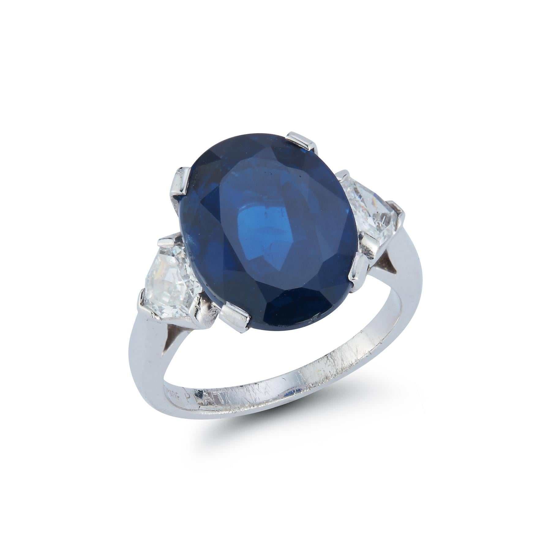 Oval Cut AGL Certified Sapphire & Diamond Three Stone Ring 
Sapphire Weight: 11.75 Cts 
Diamond Weight: Approximately .80 cts 
Ring size: 6.5
Re sizable free of charge 
Gold Type: Platinum