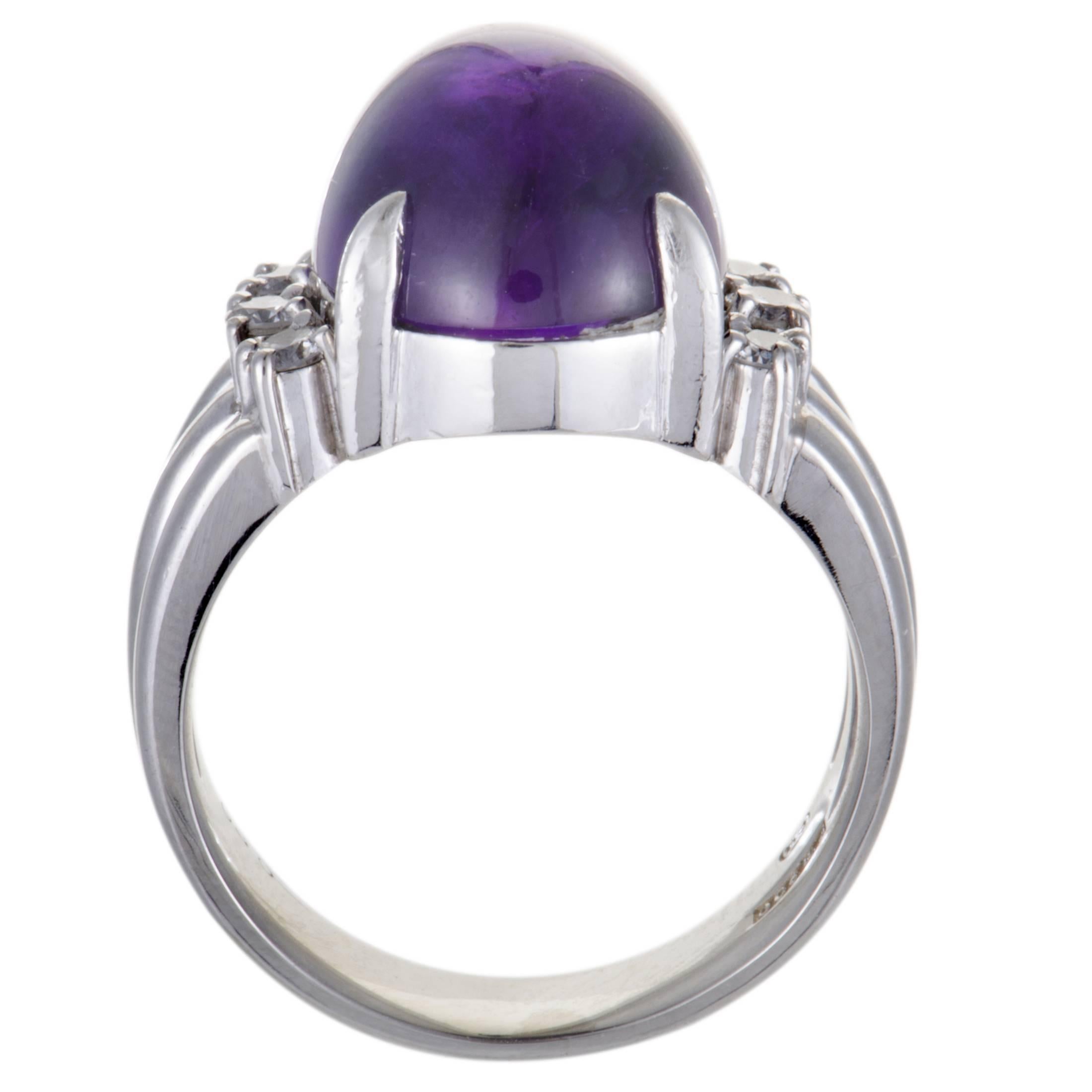 Boasting an eye-catching pop of color in the form of a stunning amethyst, this splendid platinum ring offers a compellingly fashionable appearance. The endearing beauty of the ring is accentuated by glistening diamond stones that amount to 0.30