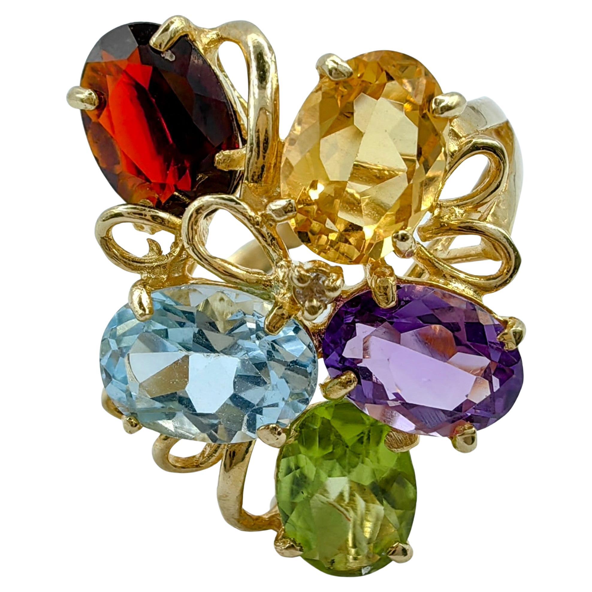 Ring aus 14 Karat Gelbgold mit Amethyst im Ovalschliff, Citrin, Granat, Peridot und Topas