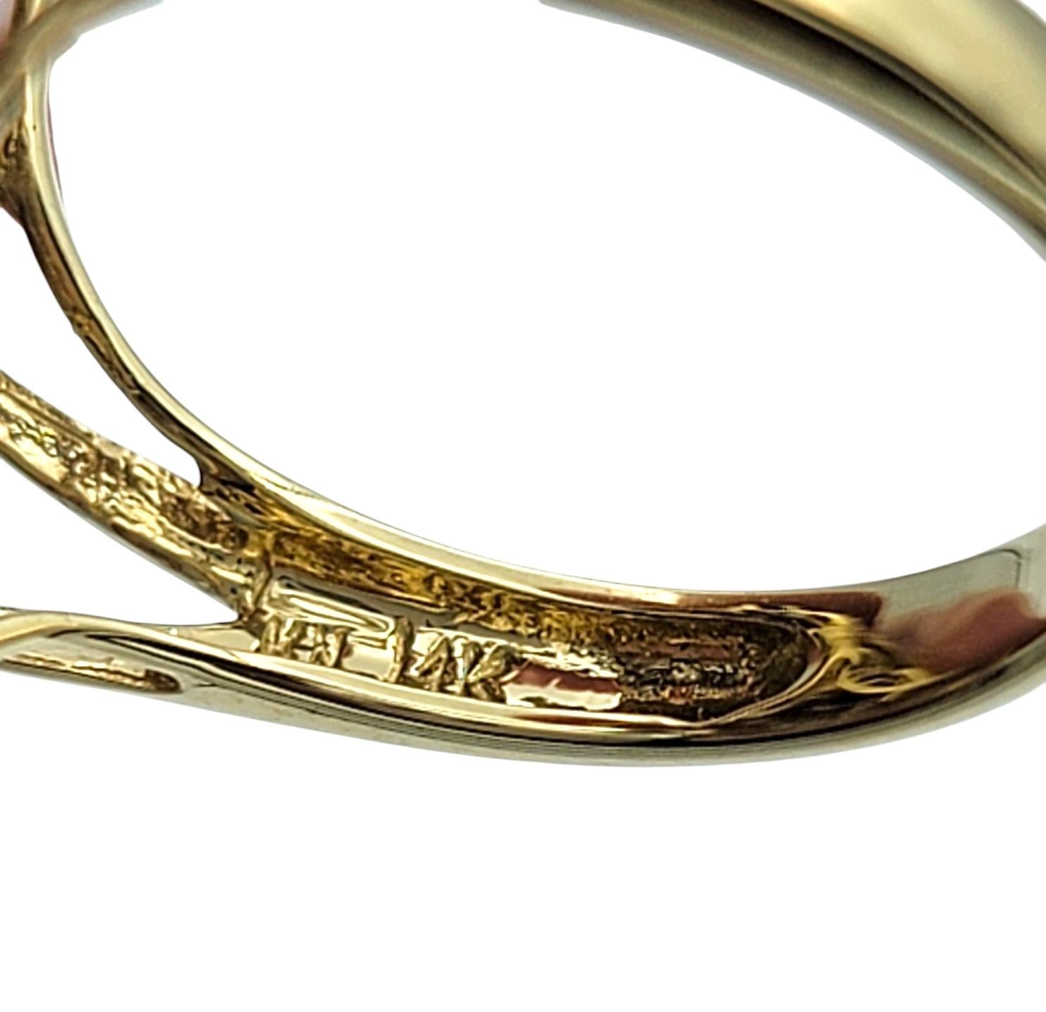 Oval Cut Aquamarine and Diamond Cluster Cocktail Ring in 14 Karat Yellow Gold For Sale 1