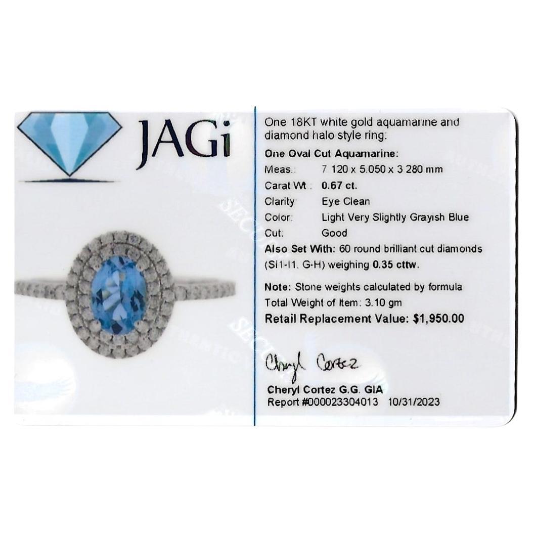 Oval Cut Aquamarine and Pavé Diamond Double Halo Ring Set in 18 Karat White Gold For Sale 6