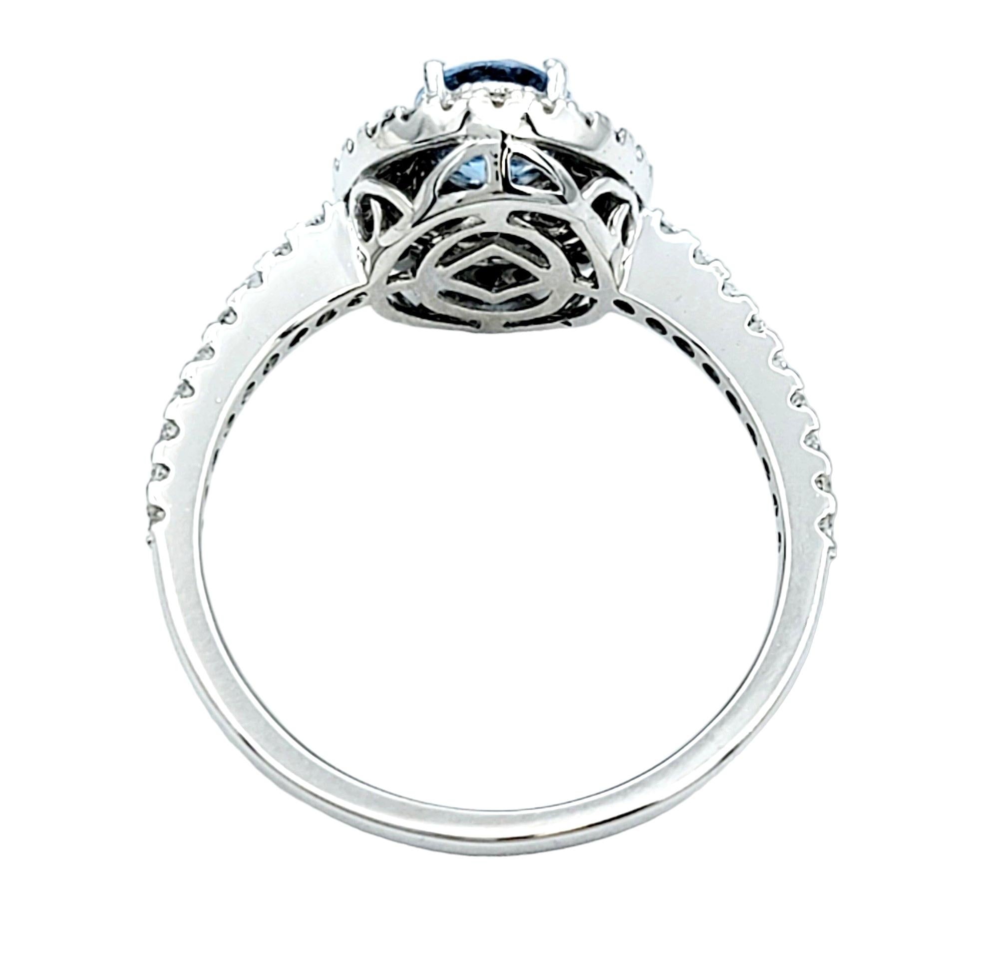 Women's Oval Cut Aquamarine and Pavé Diamond Double Halo Ring Set in 18 Karat White Gold For Sale