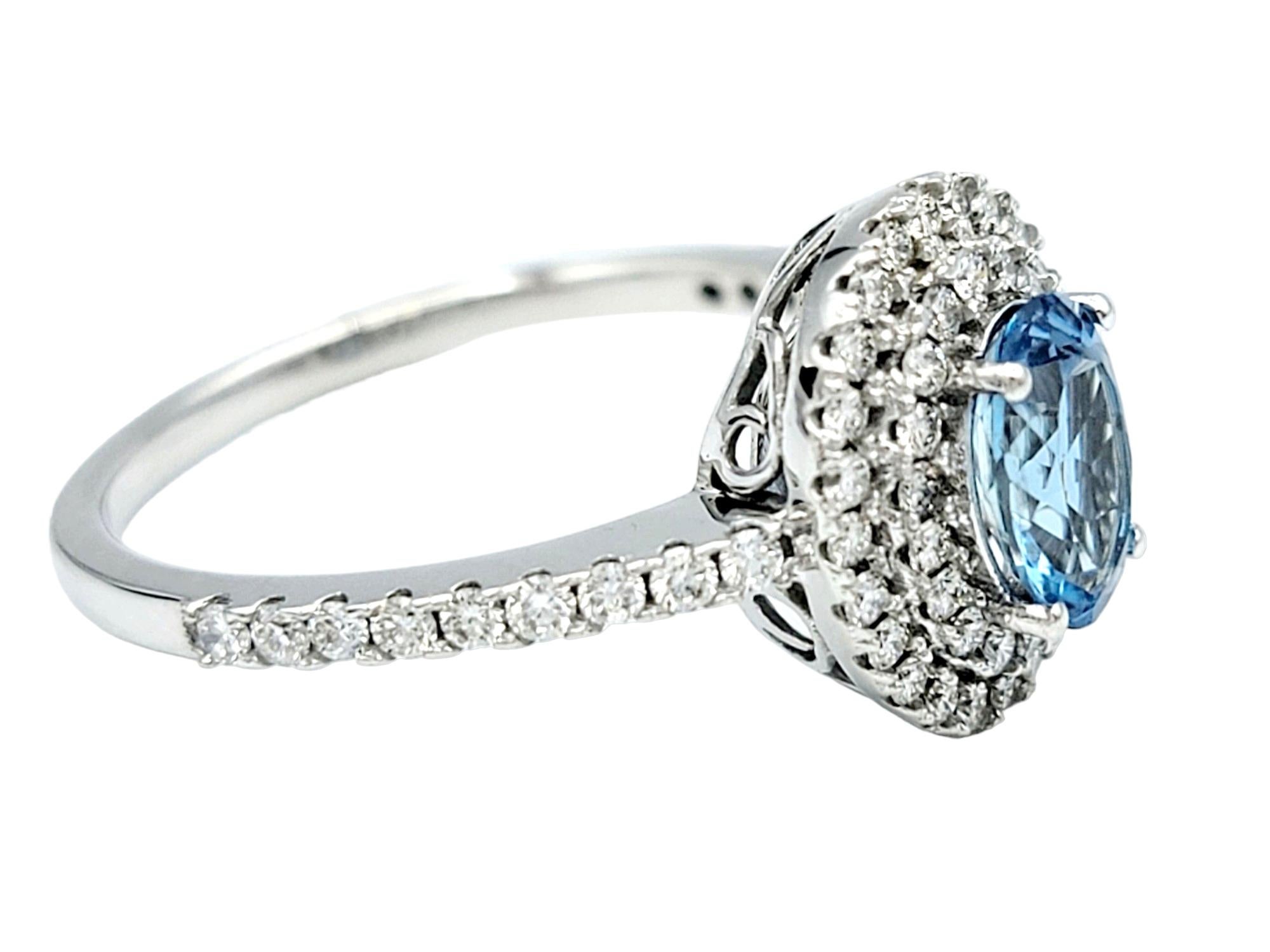 Oval Cut Aquamarine and Pavé Diamond Double Halo Ring Set in 18 Karat White Gold For Sale 1