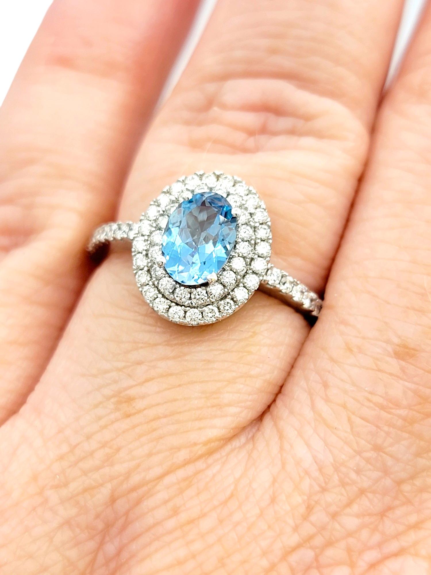 Oval Cut Aquamarine and Pavé Diamond Double Halo Ring Set in 18 Karat White Gold For Sale 3