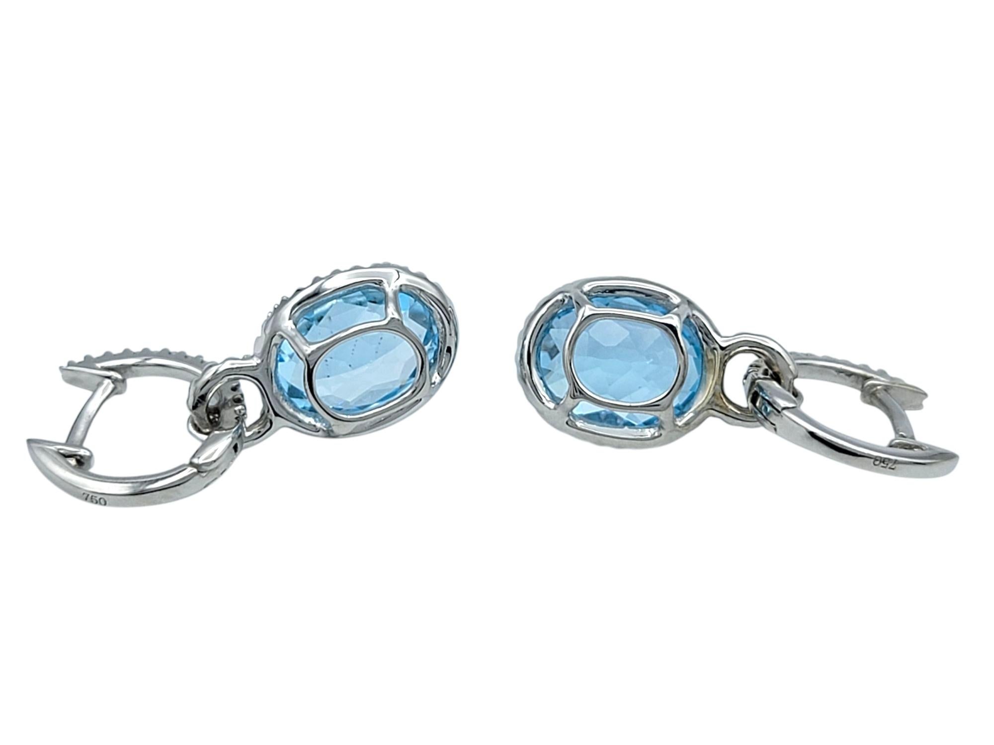 Oval Cut Aquamarine and Pavé Diamond Halo Dangle Earrings in 18 Karat White Gold In Good Condition For Sale In Scottsdale, AZ