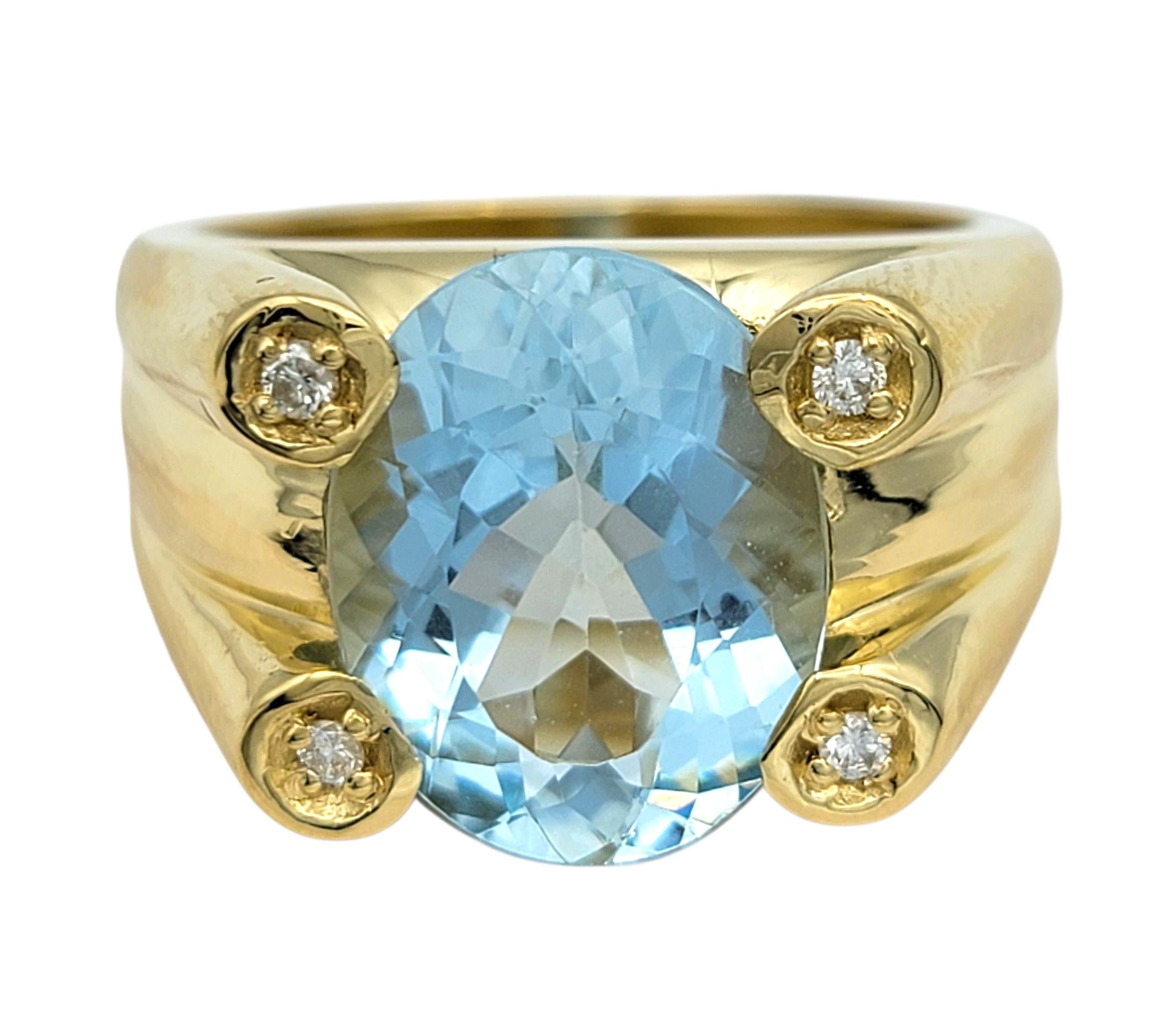 Misura dell'anello: 7,5

Questo anello audace e luminoso presenta un'acquamarina dal taglio ovale di 4,27 carati in una radiosa tonalità azzurra, incastonata in una sostanziosa montatura in oro giallo 18 carati. Il colore tenue e le dimensioni