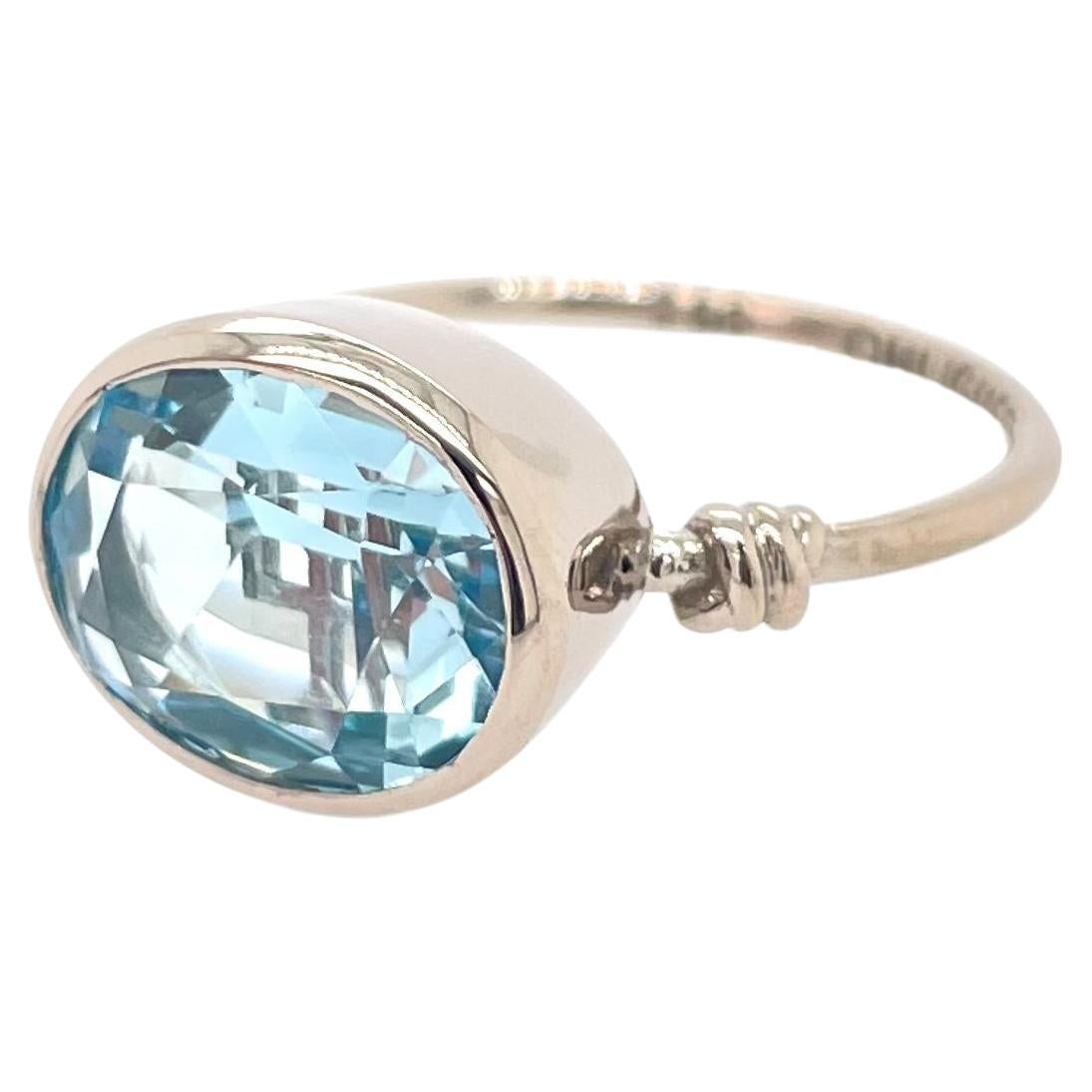 For Sale:  Oval cut Aquamarine in Love Knot Style Ring in 18ct White Gold
