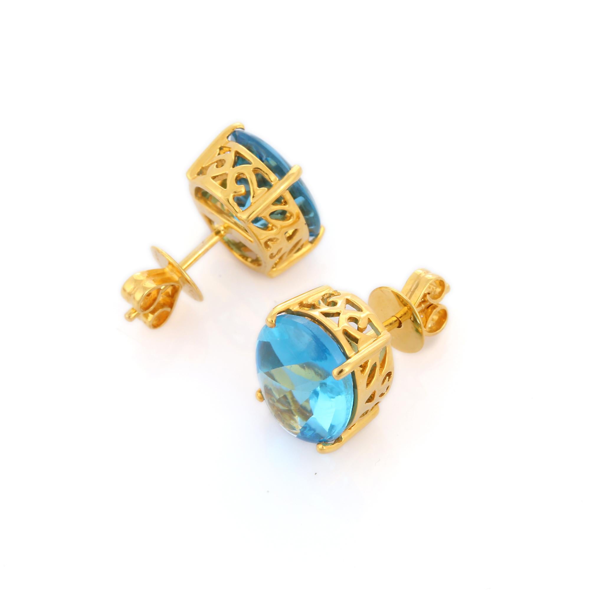 Taille ovale Clous d'oreilles en or jaune 18 carats avec topaze bleue de taille ovale de style Art déco 10 carats en vente