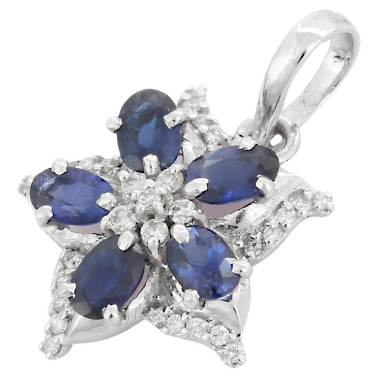 Diamond Flower Pendant with a Centre Blue Sapphire