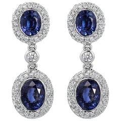 Oval Cut Blue Sapphire and Diamond Dangle Earrings