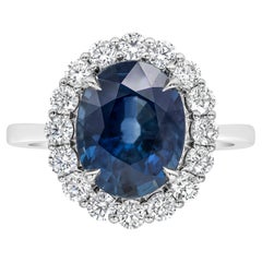 Roman Malakov Oval Cut Blue Sapphire and Diamond Halo Engagement Ring