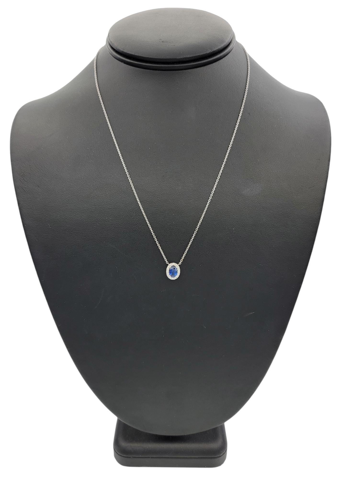 Oval Cut Blue Sapphire and Diamond Halo Pendant Necklace in 18 Karat White Gold For Sale 5